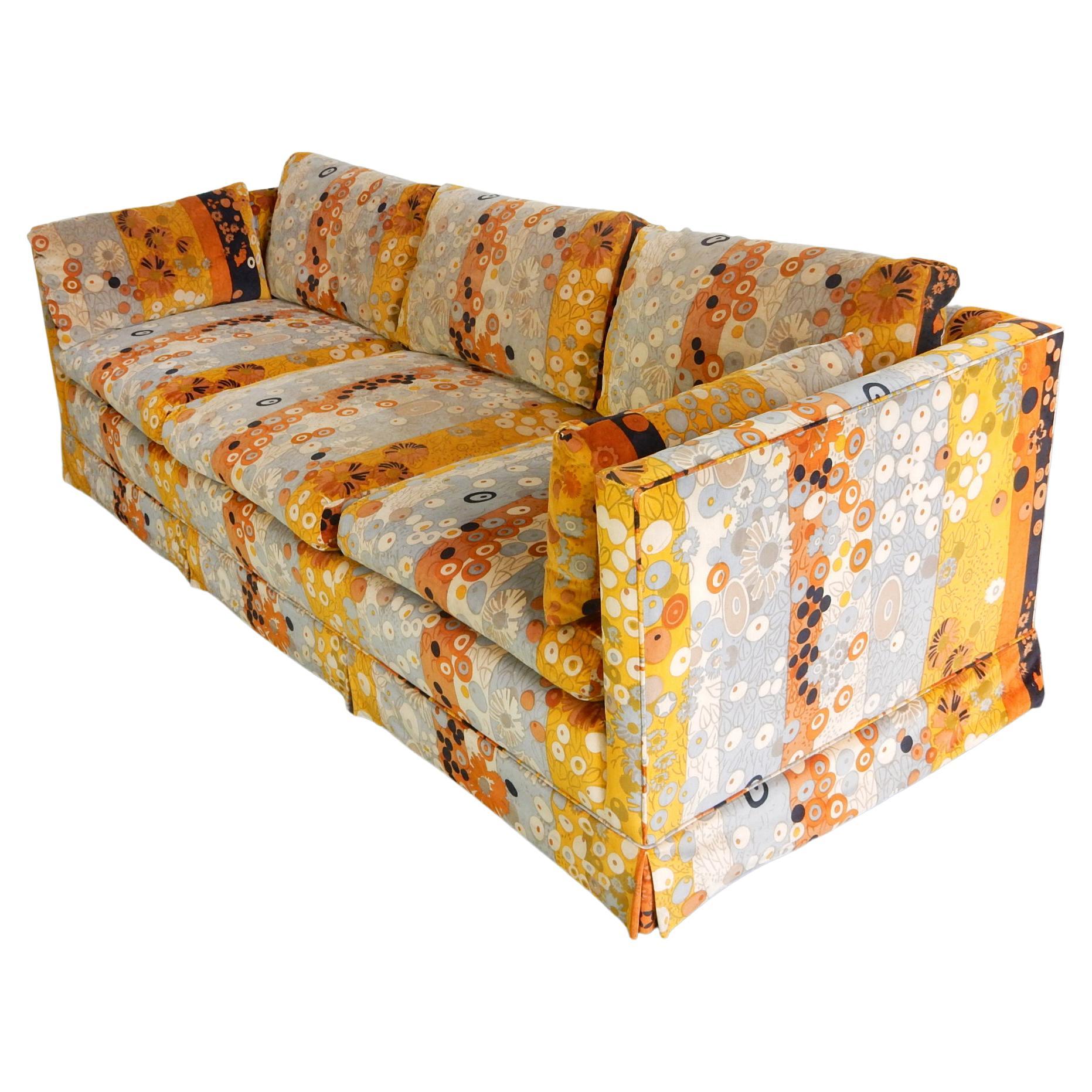 Gorgeous down filled sofa upholstered in Jack Lenor Larsen Primavera velvet with a pair of oversize matching ottomans.
This is a huge living room set, gently used and in amazing clean condition with no holes, stains or odors.
Dated 1973 on