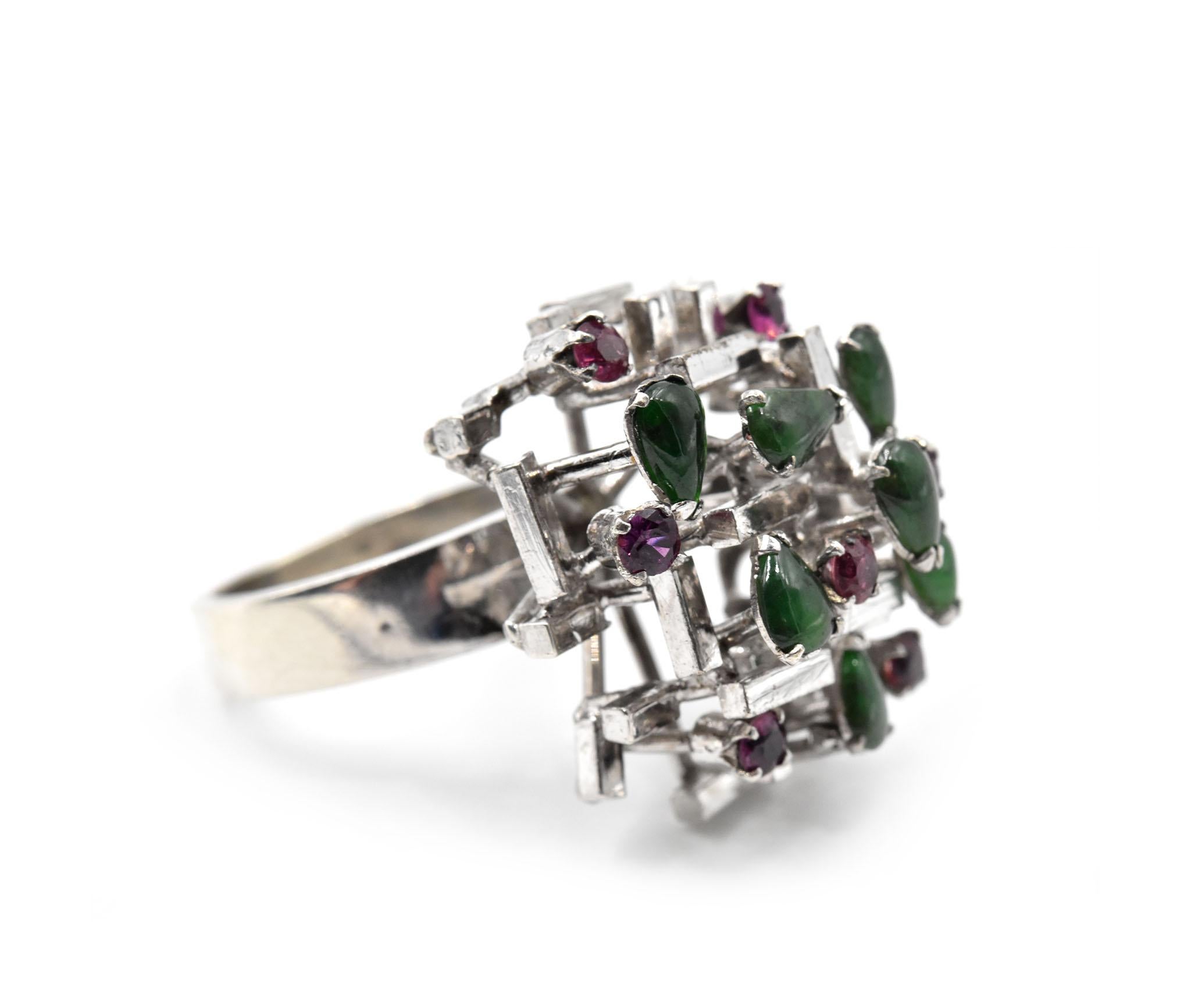 Designer: custom design
Material: 14k white gold
Circa: 1950s
Gemstones: vintage jade & cabochon cut ruby
Ring Size: 5 1/2 (please allow two additional shipping days for sizing requests)
Weight: 9.33 grams
