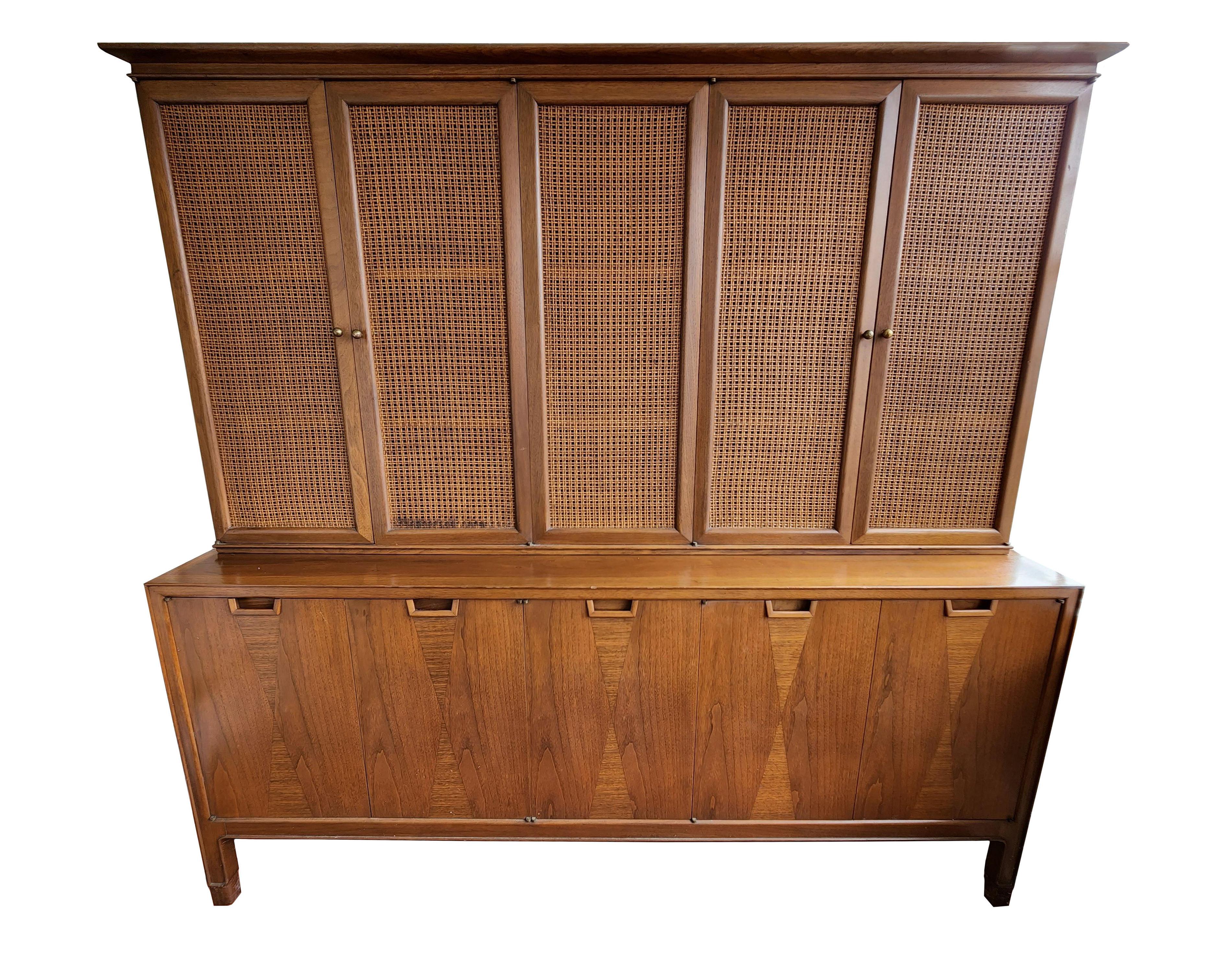 Rare Designer John Stuart for Mount Airy Lodge Sideboard

This is the definition of Mid-Century Modern. A true muted walnut finish so impressive of that era. An important historical piece captured in time, when life was good, a throwback to some