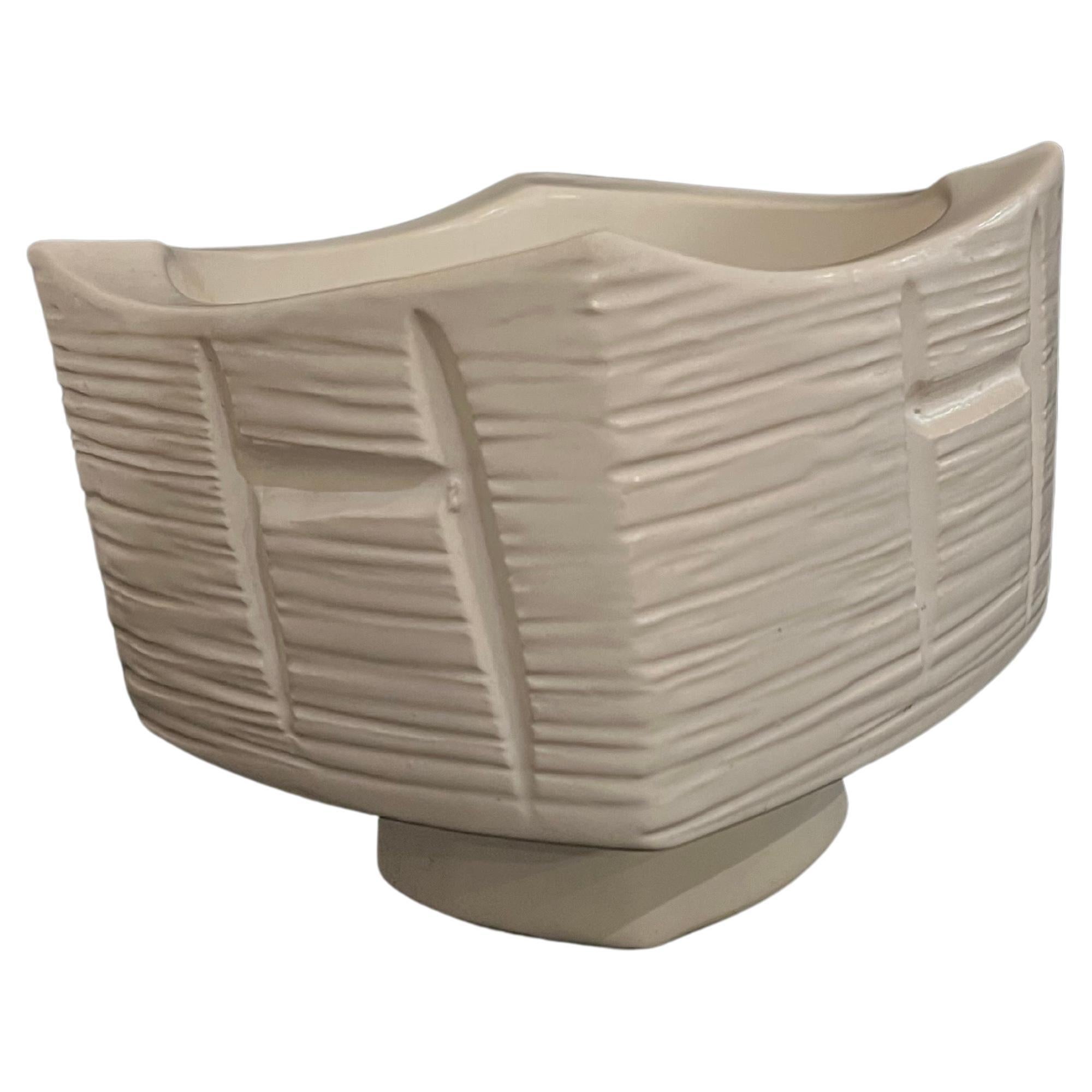 Beautiful white matte color glaze, design, and shape on this ceramic, shape Ikebana bowl or planter. stamped on the bottom small fleabite on the corner as shown and some irregularities sold AS/IS condition.