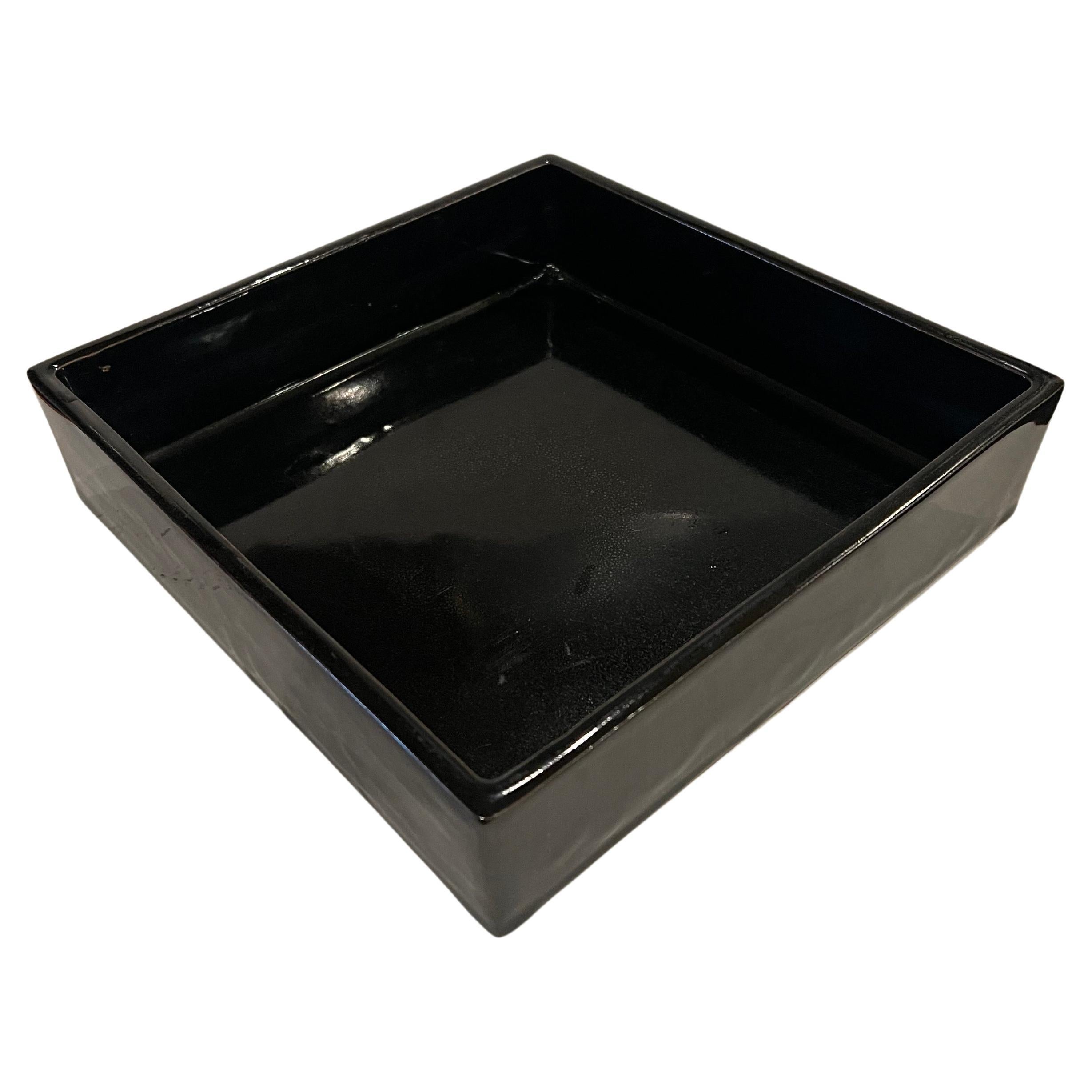 Beautiful black glossy glaze, design, and shape on this ceramic, square shape Ikebana bowl or planter. Stamped in the bottom no chips or cracks.