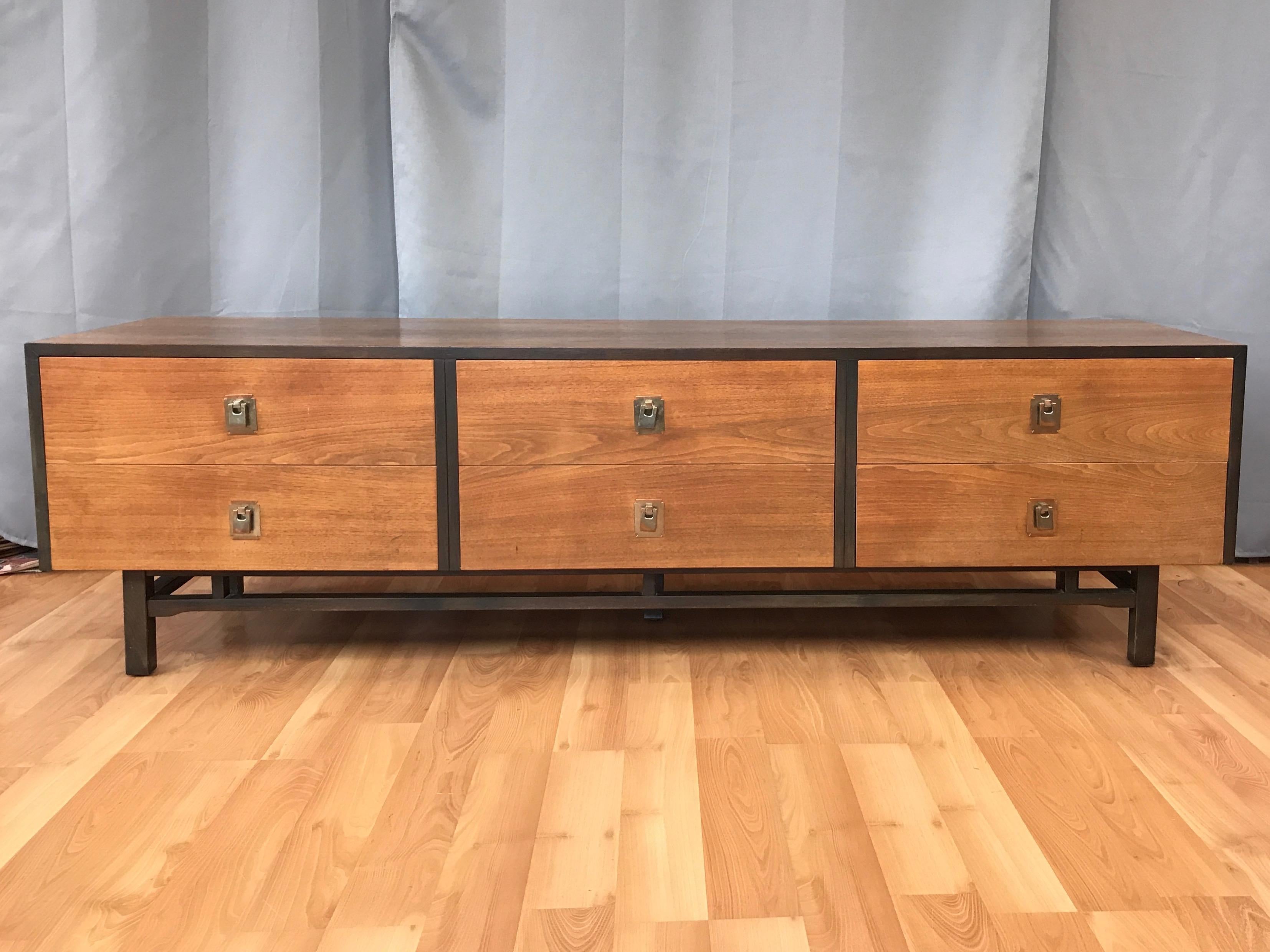 A 1950s six-drawer elm sideboard or credenza, made in Japan.

Long and low, with a clean Mid-Century Modern design that would complement pieces by McCobb, Knoll, and Nelson, with a few subtle Asian-style touches that set it apart. 

Features a