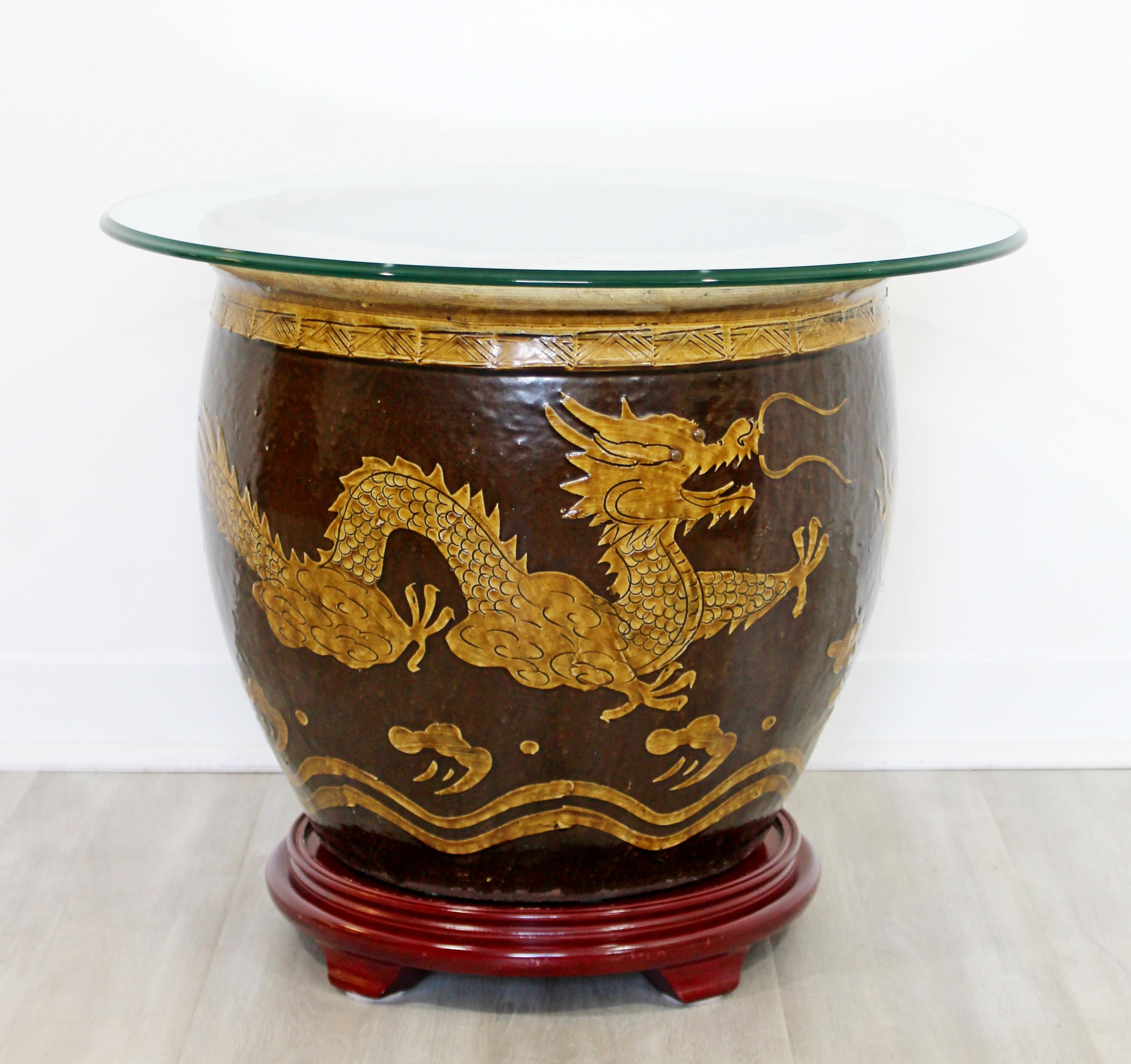 For your consideration is a magnificent, jardinière ceramic vessel or planter, with a glass top, making it a side table, with a dragon motif. In very good vintage condition. The dimensions are 24