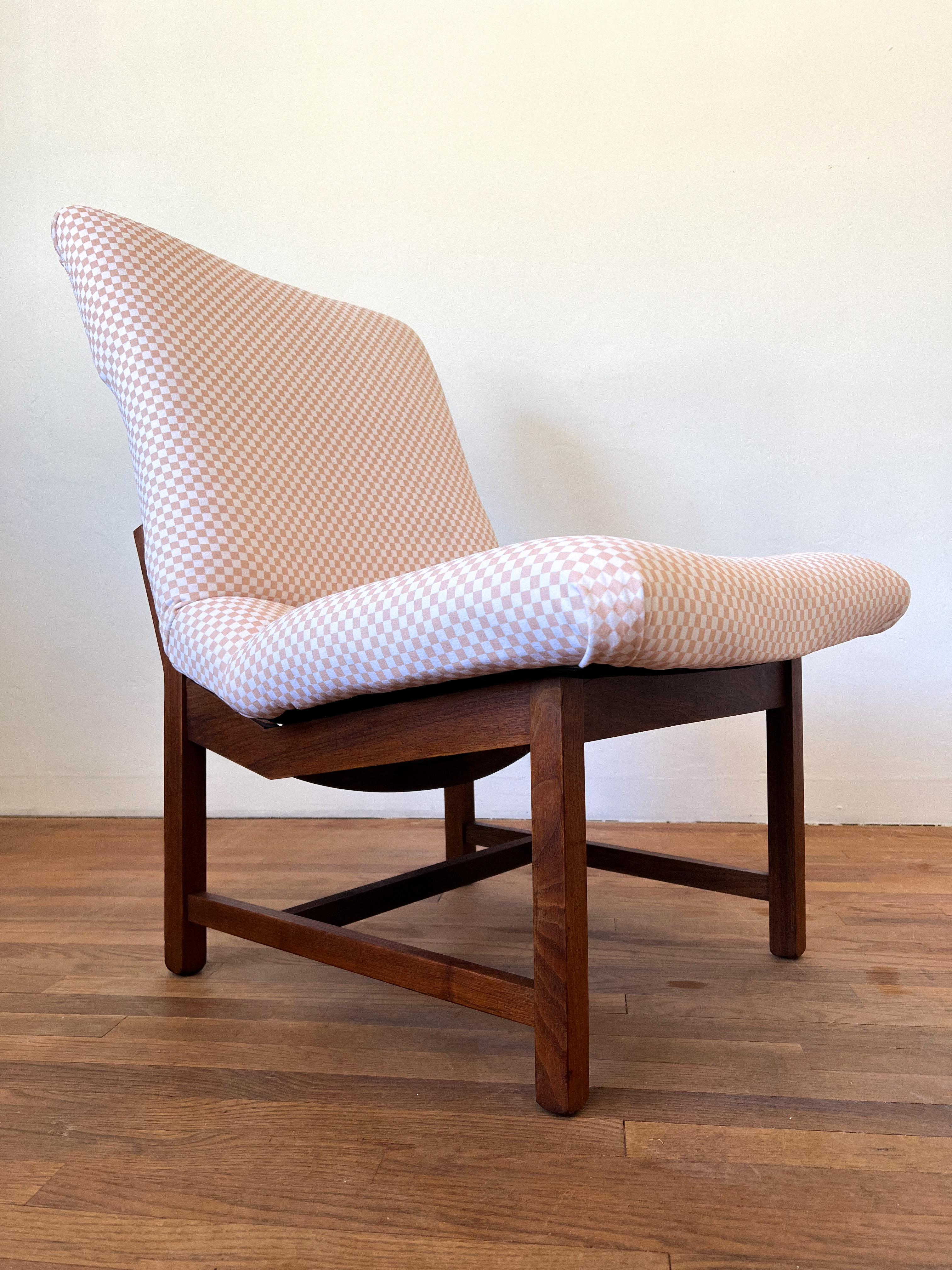 Mid Century Modern slipper lounge chair in the style of Jens Risom. Newly re-upholstered in an off white/cream checkered fabric. One of the most comfortable chairs you will ever sit in. The fabric is extremely soft and high quality. The Risom lines
