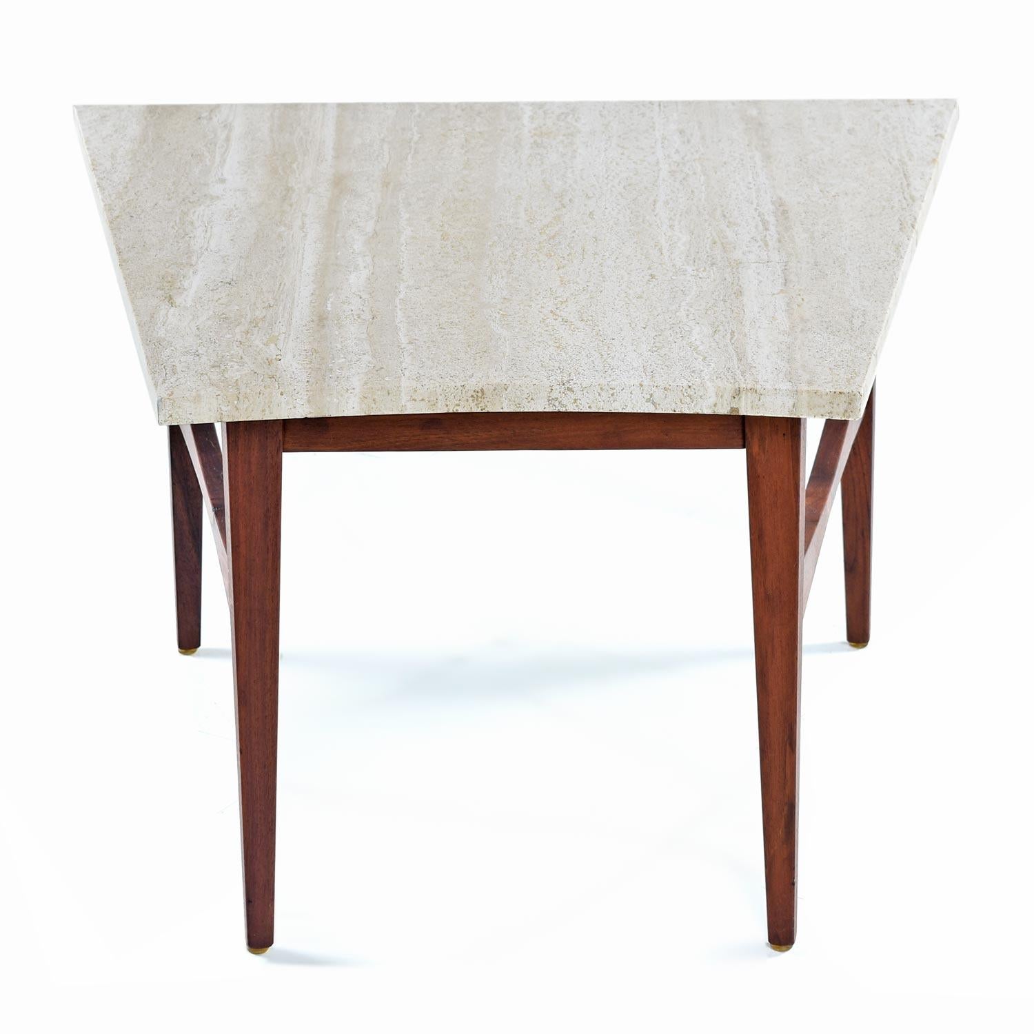 Unique wedge shaped Mid-Century Modern end table in the style of Jens Risom. Triangle shape Italian travertine (stone) top with solid walnut wood frame. Tapered Danish look to the spanners and legs. Note the gentle bow-tie contour to the
