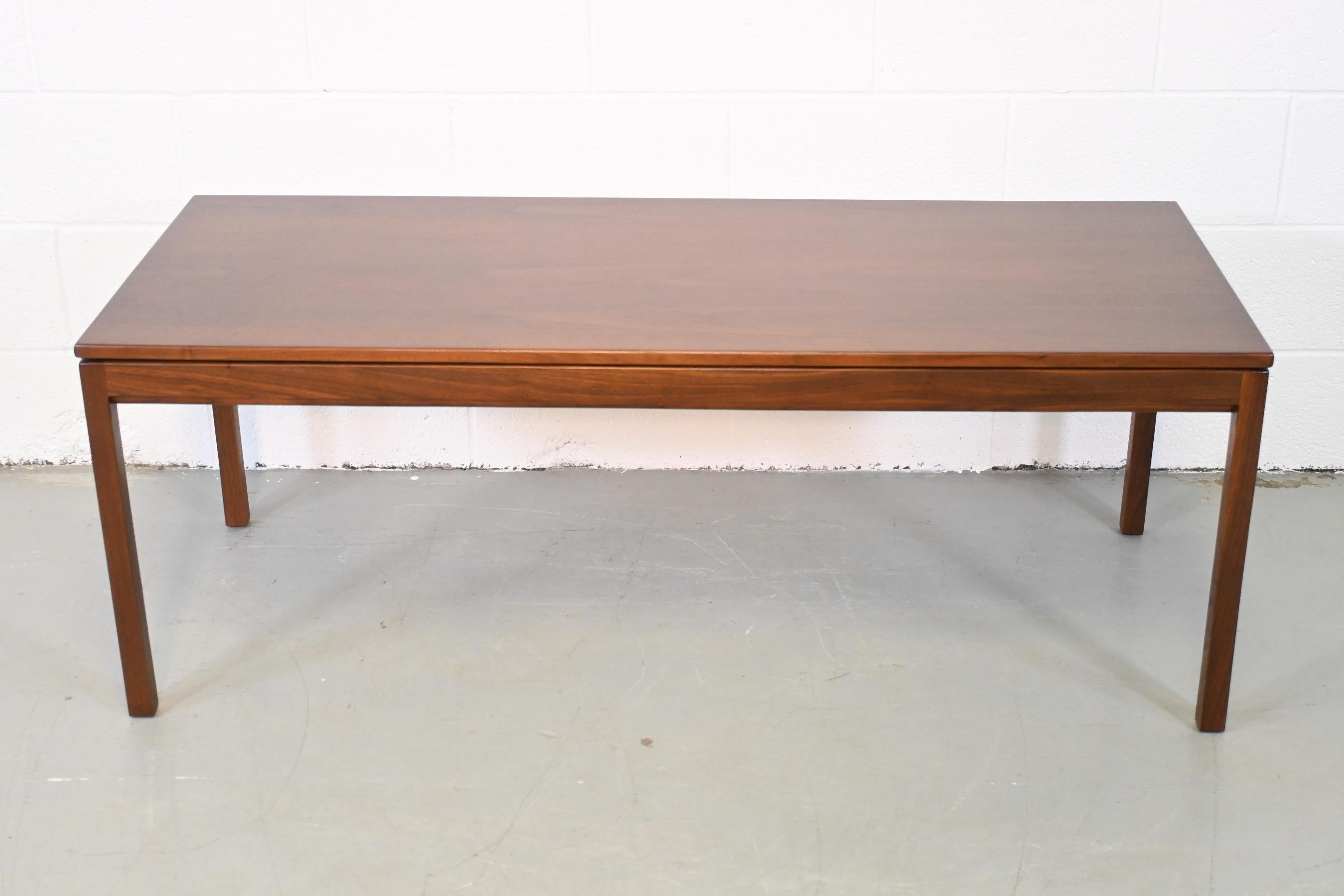 Jens Risom Mid-Century Modern walnut coffee table

Jens Risom, USA, 1960s

Measures: 54 Wide x 22 Deep x 20 High.

Mid-Century Modern medium brown walnut rectangular coffee table.

Professionally Refinished. Excellent condition.