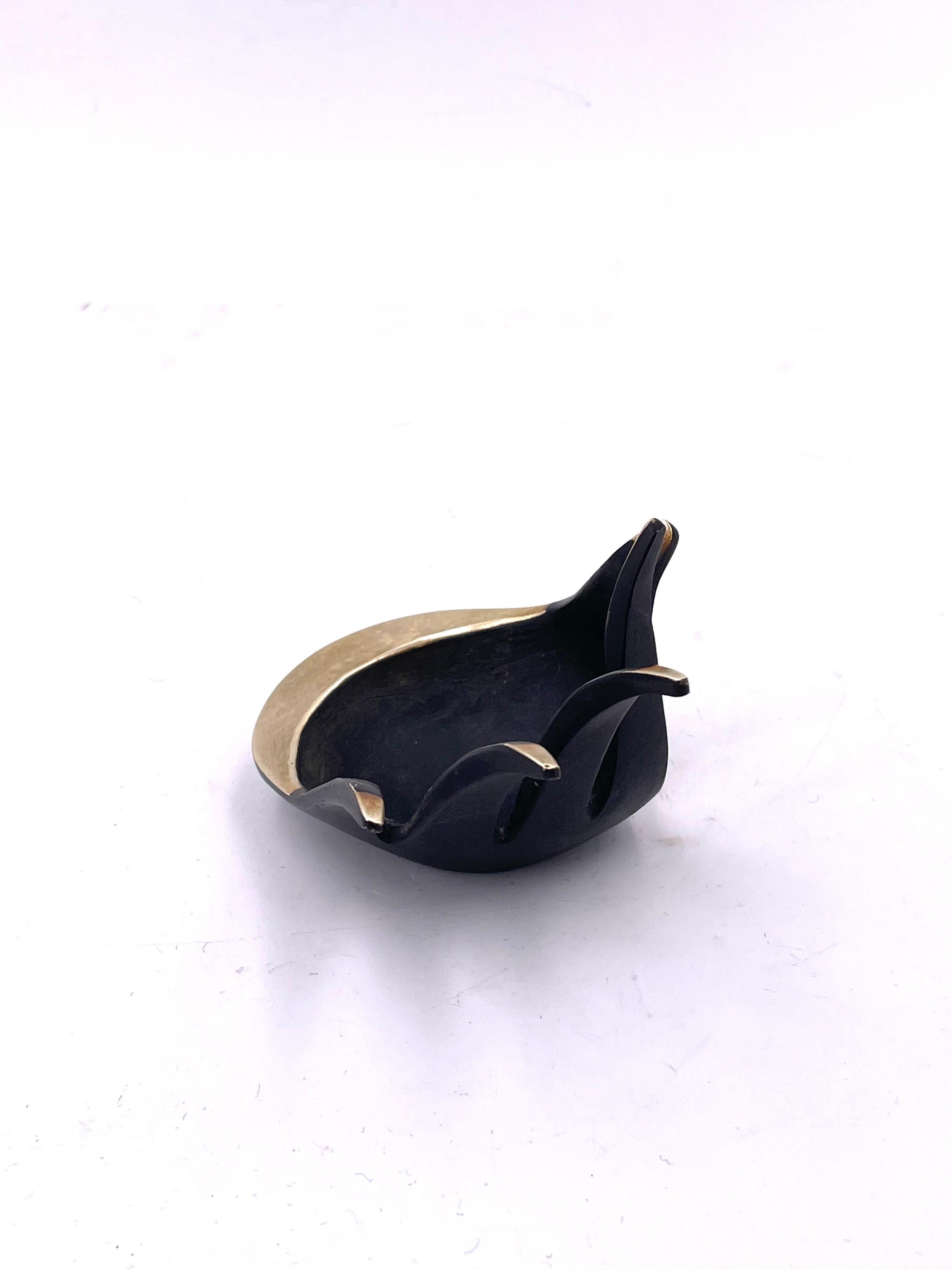 Whimsical and unique solid brass catch it all jewelry ring holder, circa 1950's practical and unique.