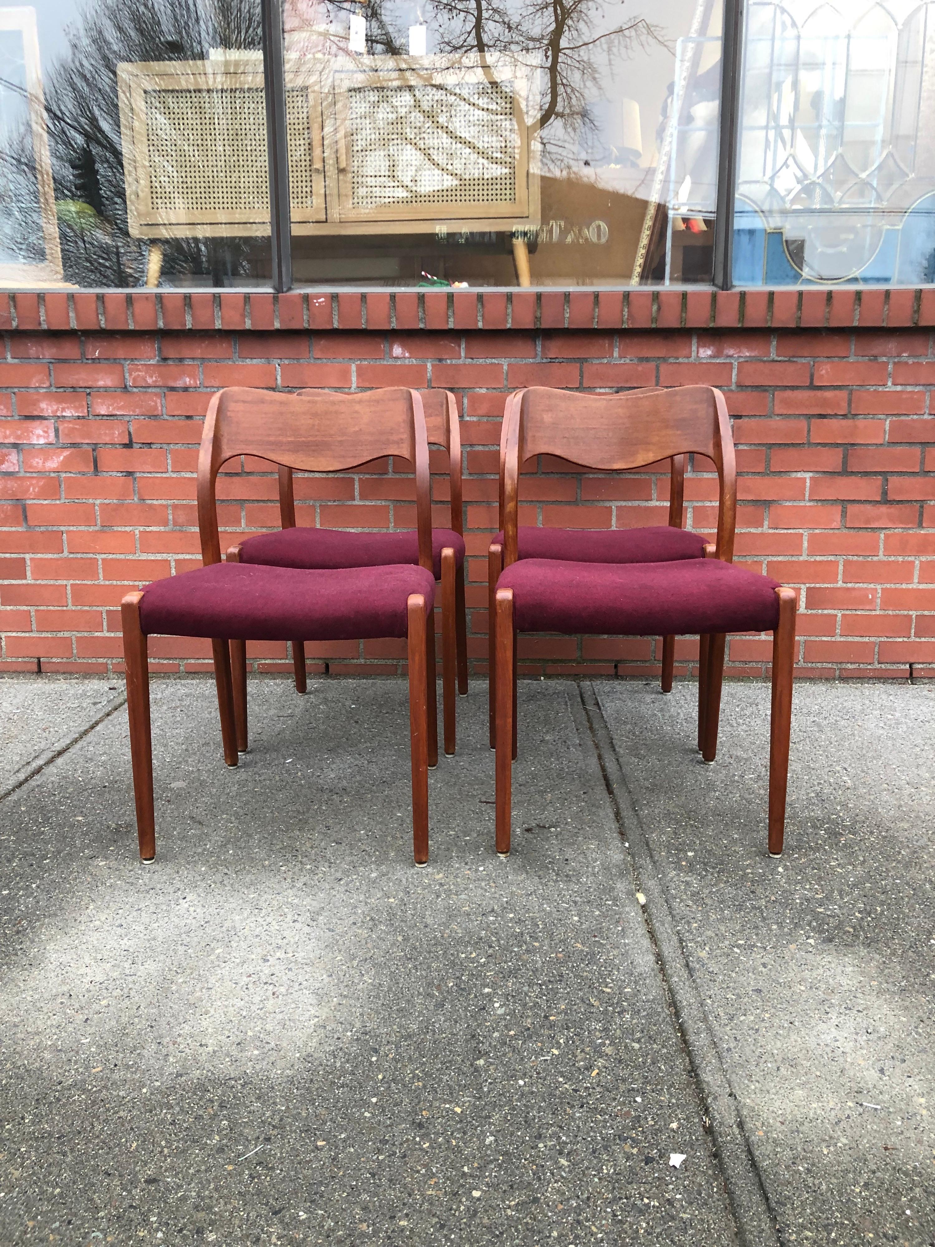 A set of 4 Scandinavian Mid-Century Modern Model 71 dining chairs in teak by Niels Otto Møller for JL Mollers, Denmark.

Overall the chairs are in great condition with occasional minimal signs of being used.