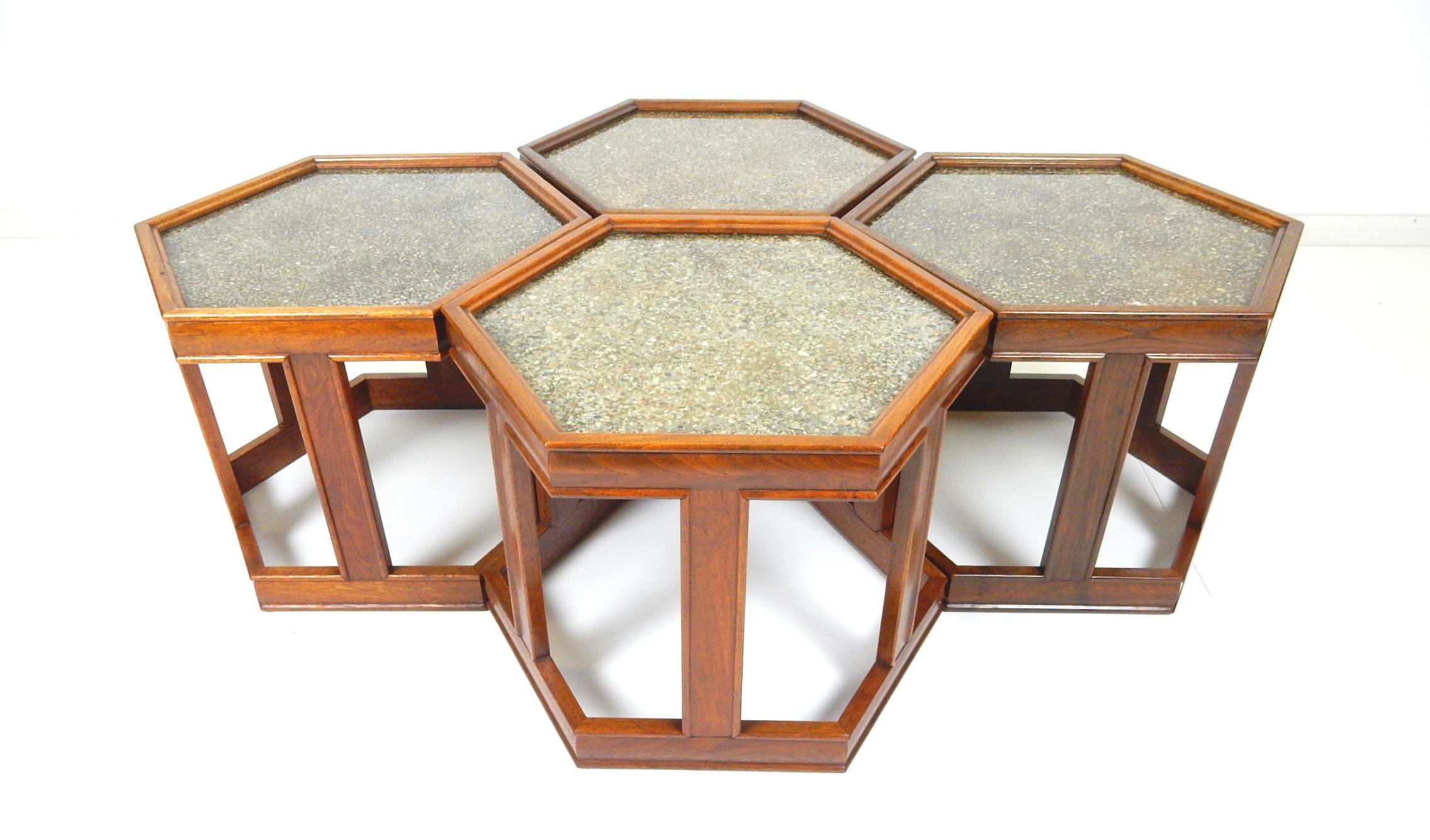 1960s designer John Keal hexagon table set by Brown Saltman .
Set makes a wonderful coffee table that splits into 4 occasional tables.
Walnut bases with gold veined pebble resin tops.
Each marked Brown-Saltman #240.
All in very good solid
