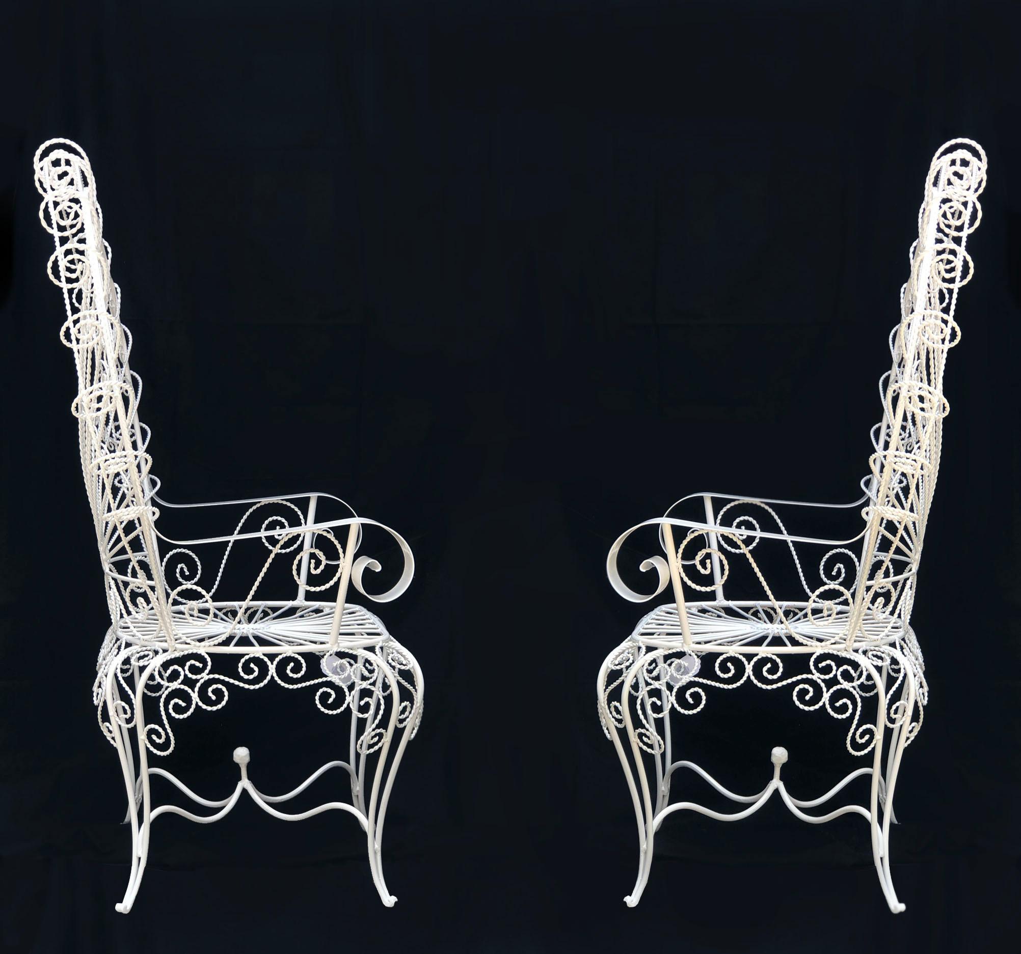 Set of four John Salterini white peacock chairs in good condition with new soft white powder coating. Made of white wrought iron and features the signature Salterini peacock back.

Sold as a set of 4. I would consider selling in a pair.