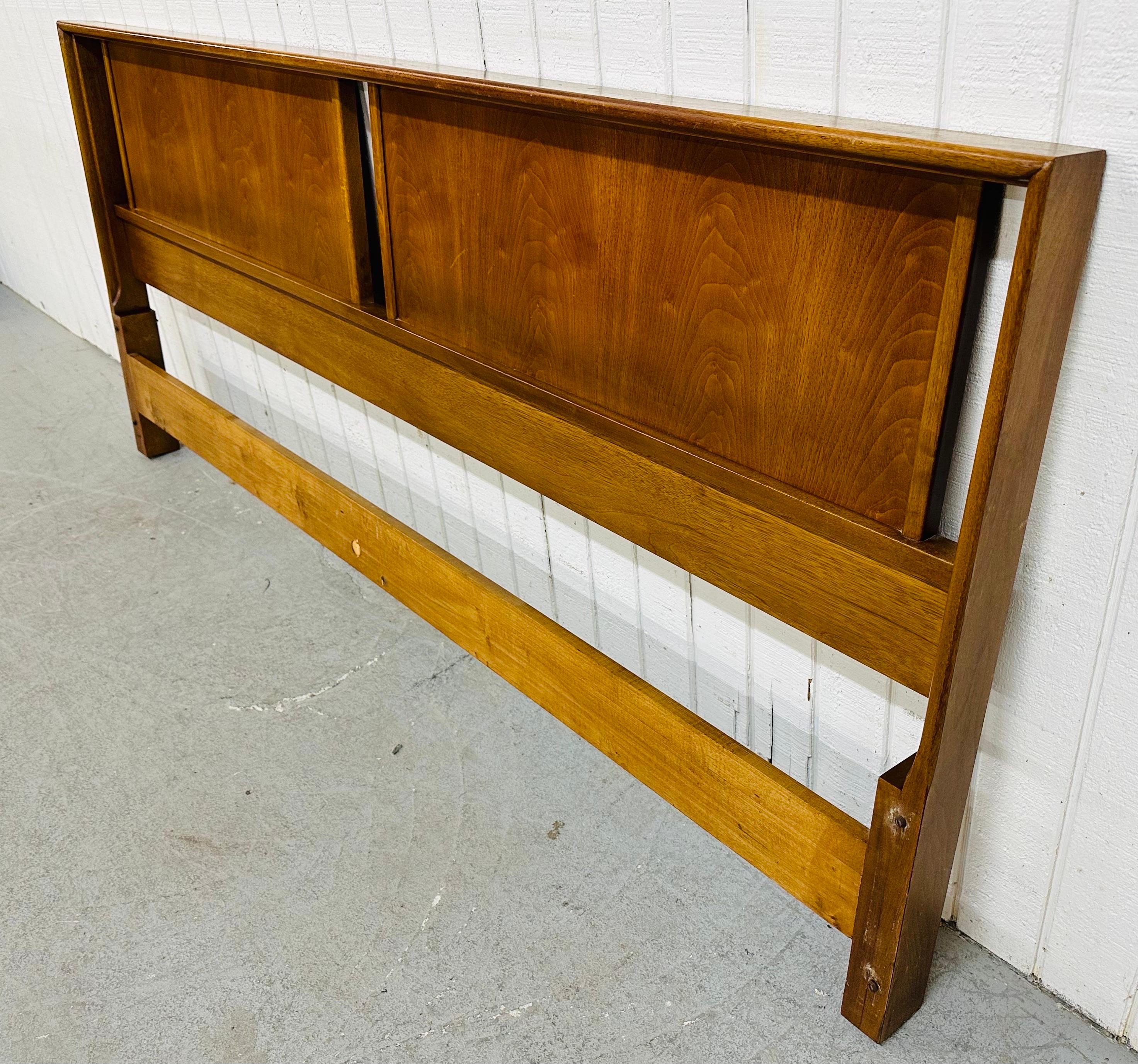 This listing is for a Mid-Century Modern John Stuart Walnut King Headboard. Featuring a straight line design, solid wood frame, and beautiful walnut finish. This is an exceptional combination of quality and design by John Stuart!