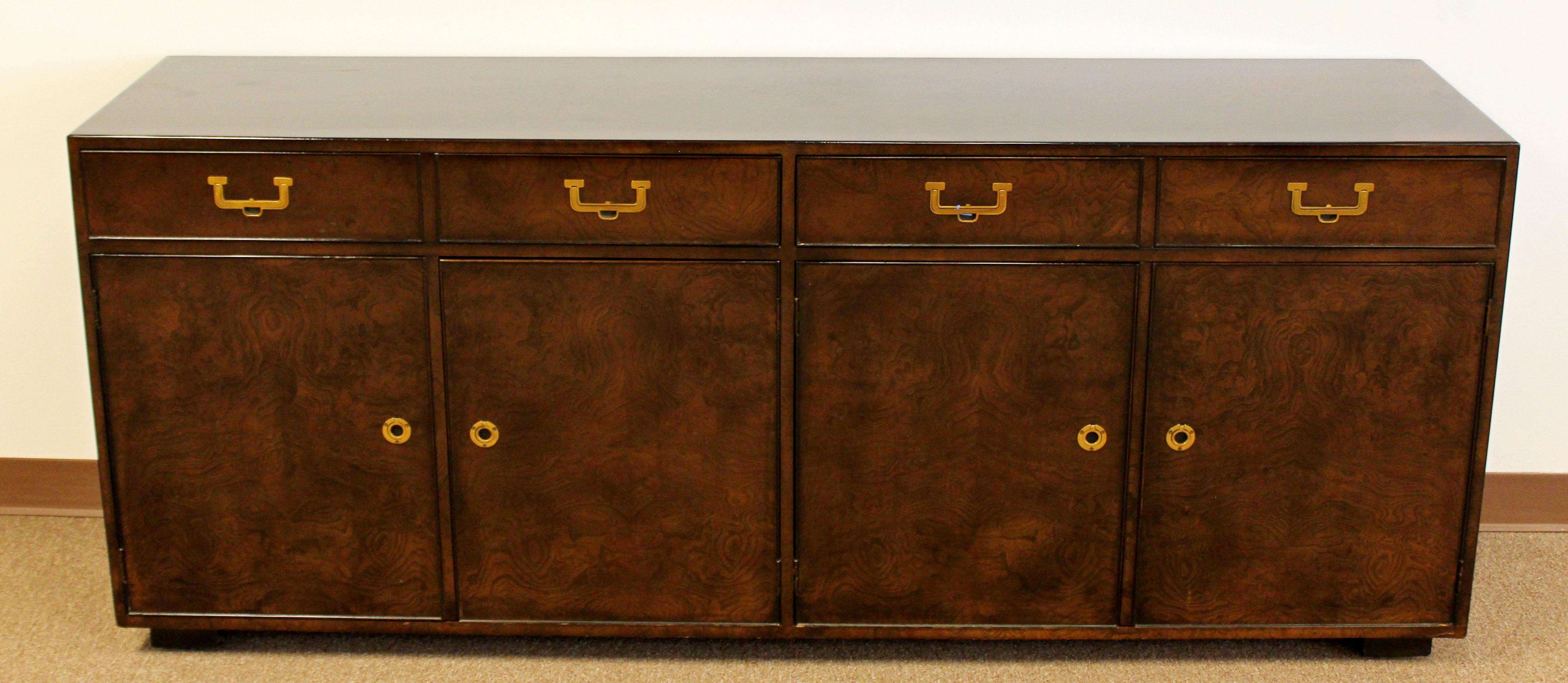 For your consideration is a phenomenal burl wood credenza, with brass pulls, two shelves and two drawers, by John Widdicomb, circa the 1950s. In good vintage condition. The dimensions are 76