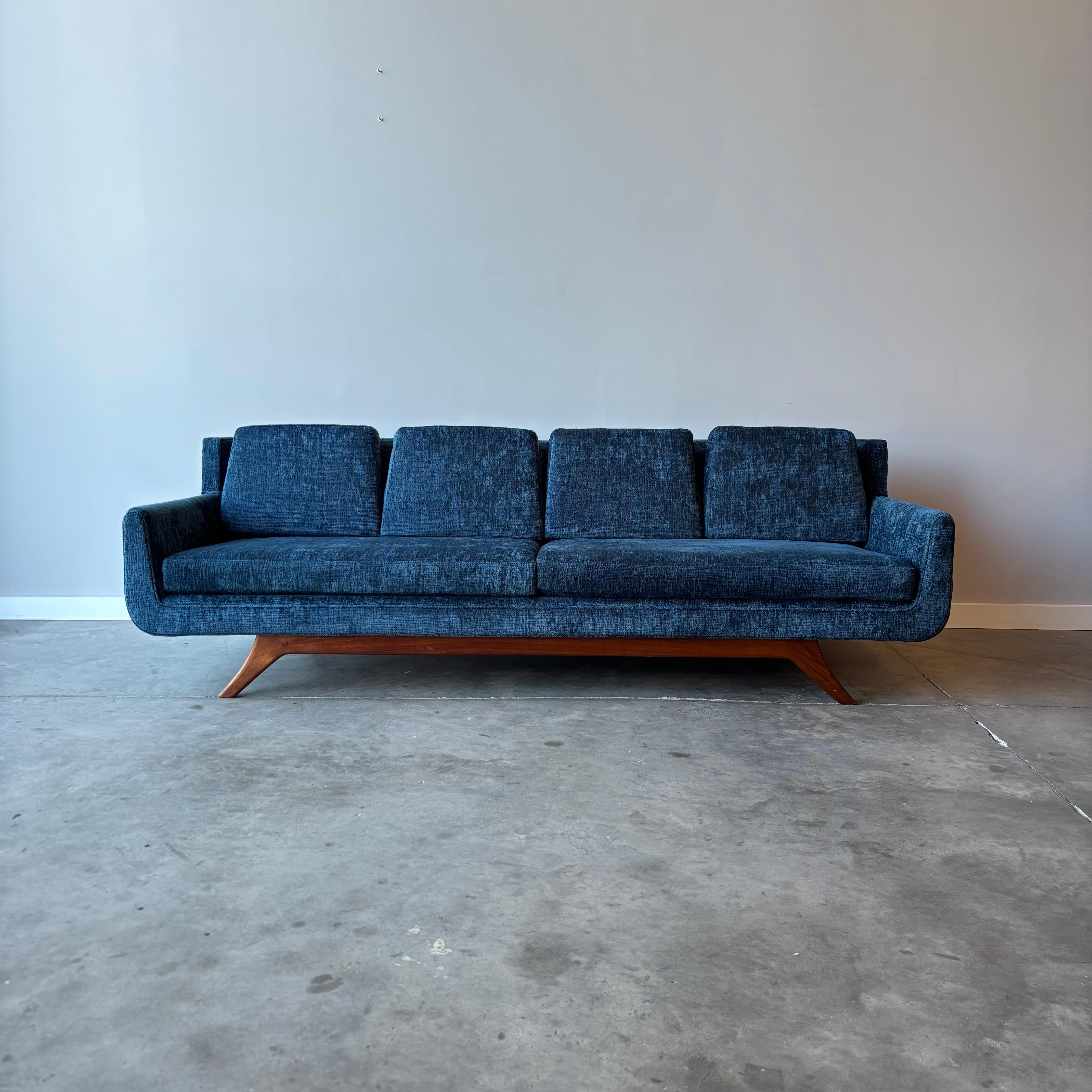 A beautiful gondola sofa in the style of Adrian Pearsall by Josef Otmar.
Recently upholstered in a luxurious velvet only having light use, looks as new.  Sculptural walnut base with light gondola form perched atop.  
A striking mid century modern
