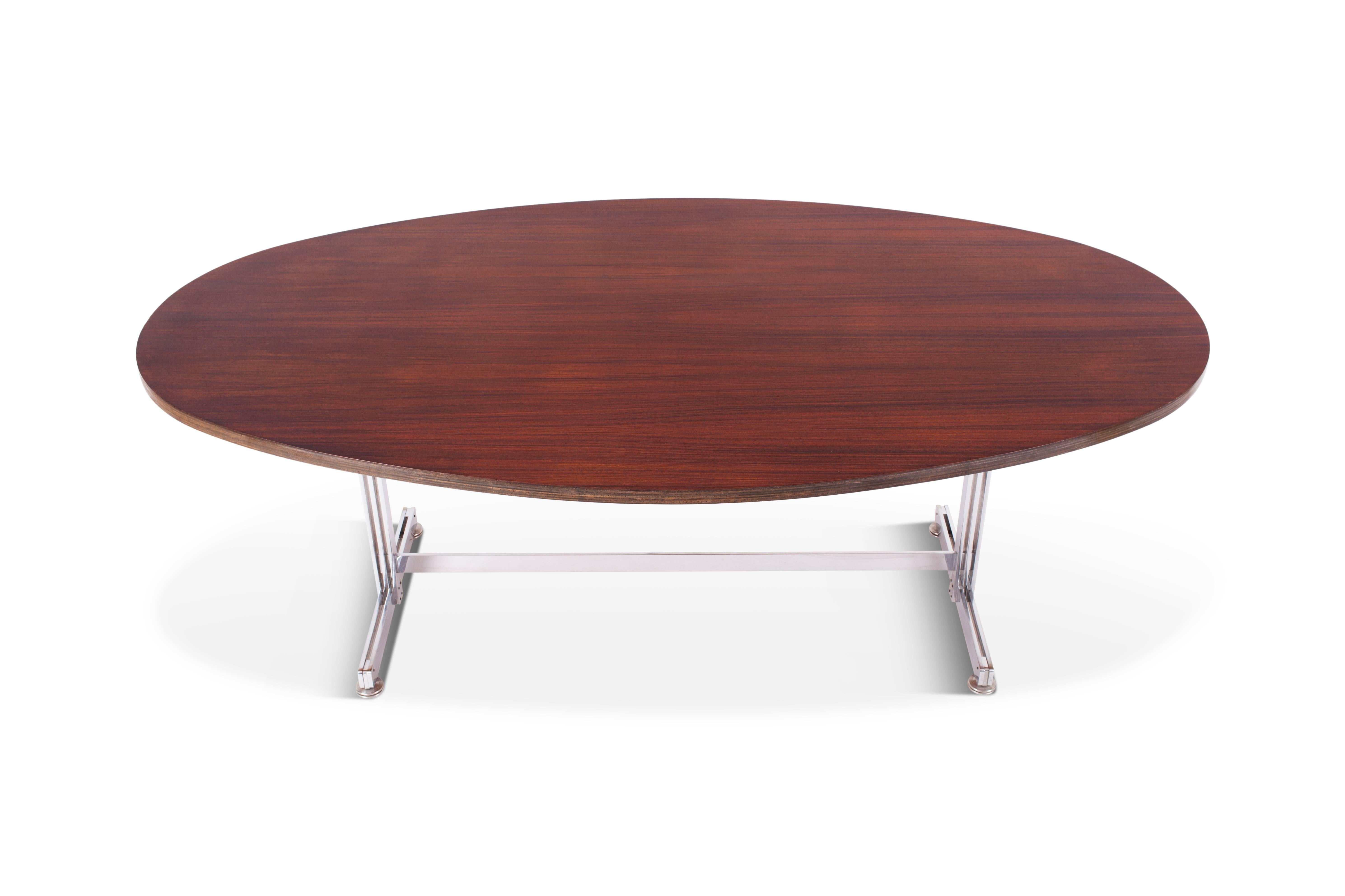 Jules Wabbes oval dining table for Mobilier Universel, circa 1960, Belgium.

Multiplex top rosewood veneer.
Heavy chrome-plated steel base.

Dimensions: W 200 cm, D 120 cm, H 75 cm.
