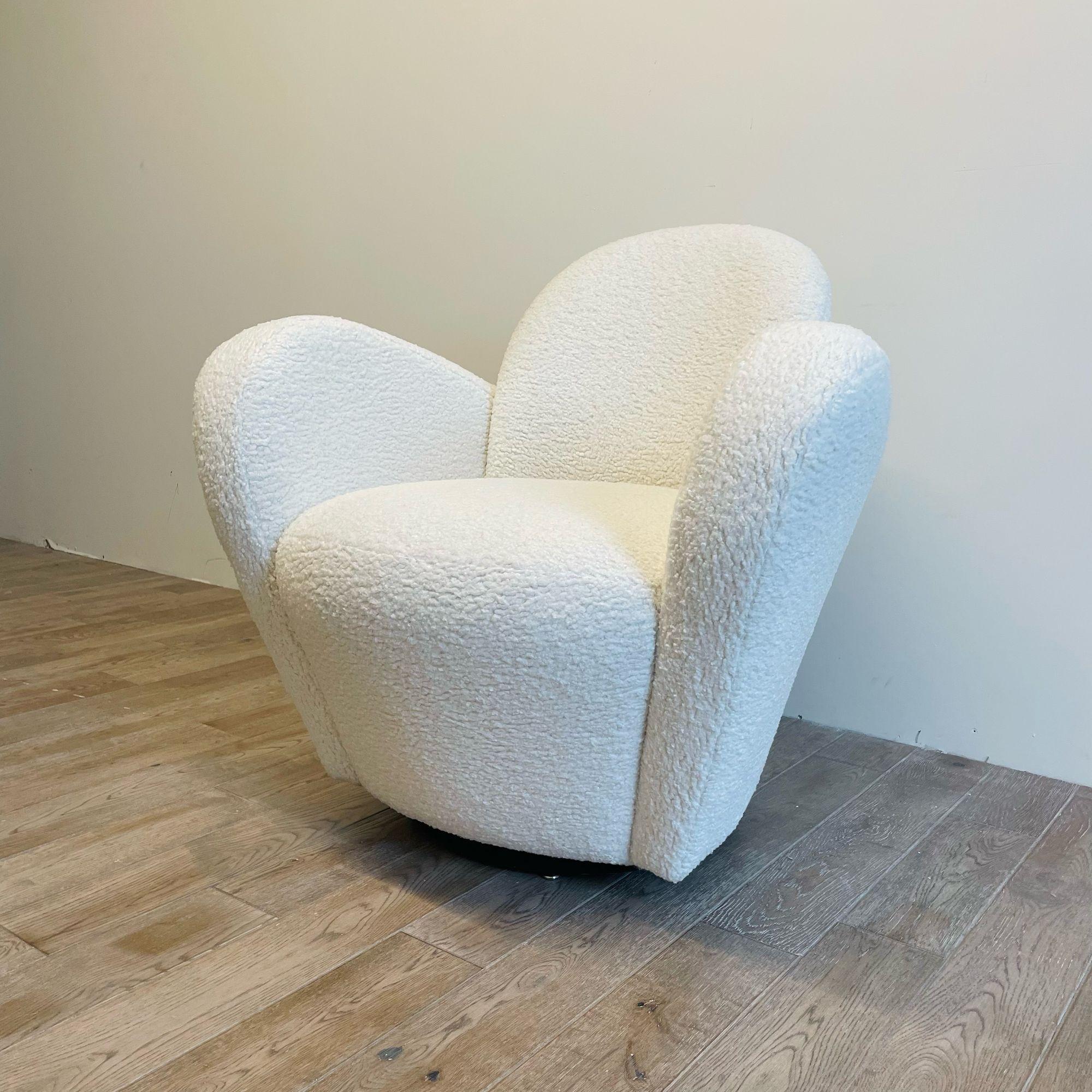 Mid-Century Modern Swivel / Lounge Chair, Michael Wolk, Boucle
 
Single organic form swivel chair newly upholstered in a luxurious white textured boucle fabric. This chair is similar in form to Vladimir Kagan's wrap around barrel swivel chair. Later