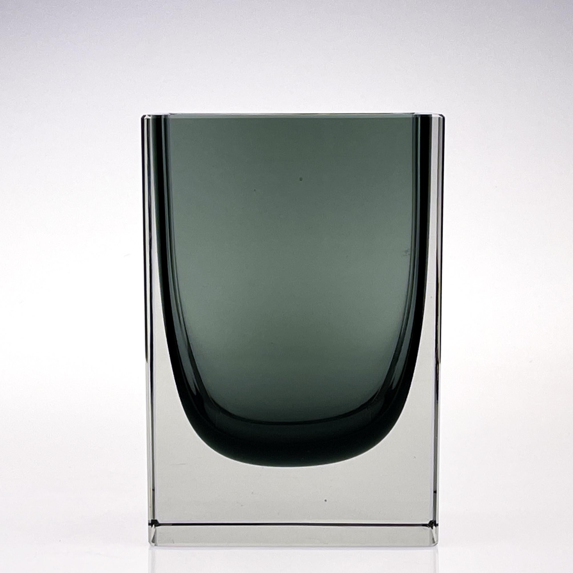 Mid Century Modern Kaj Franck Artglass Object KF262 green Handblown 1963

A fixed mould blown, cased, cut and posished art-object, model KF 262, in grey-green and clear glass. Designed by Kaj Franck in 1960 and executed by the Nuutajärvi-Notsjö