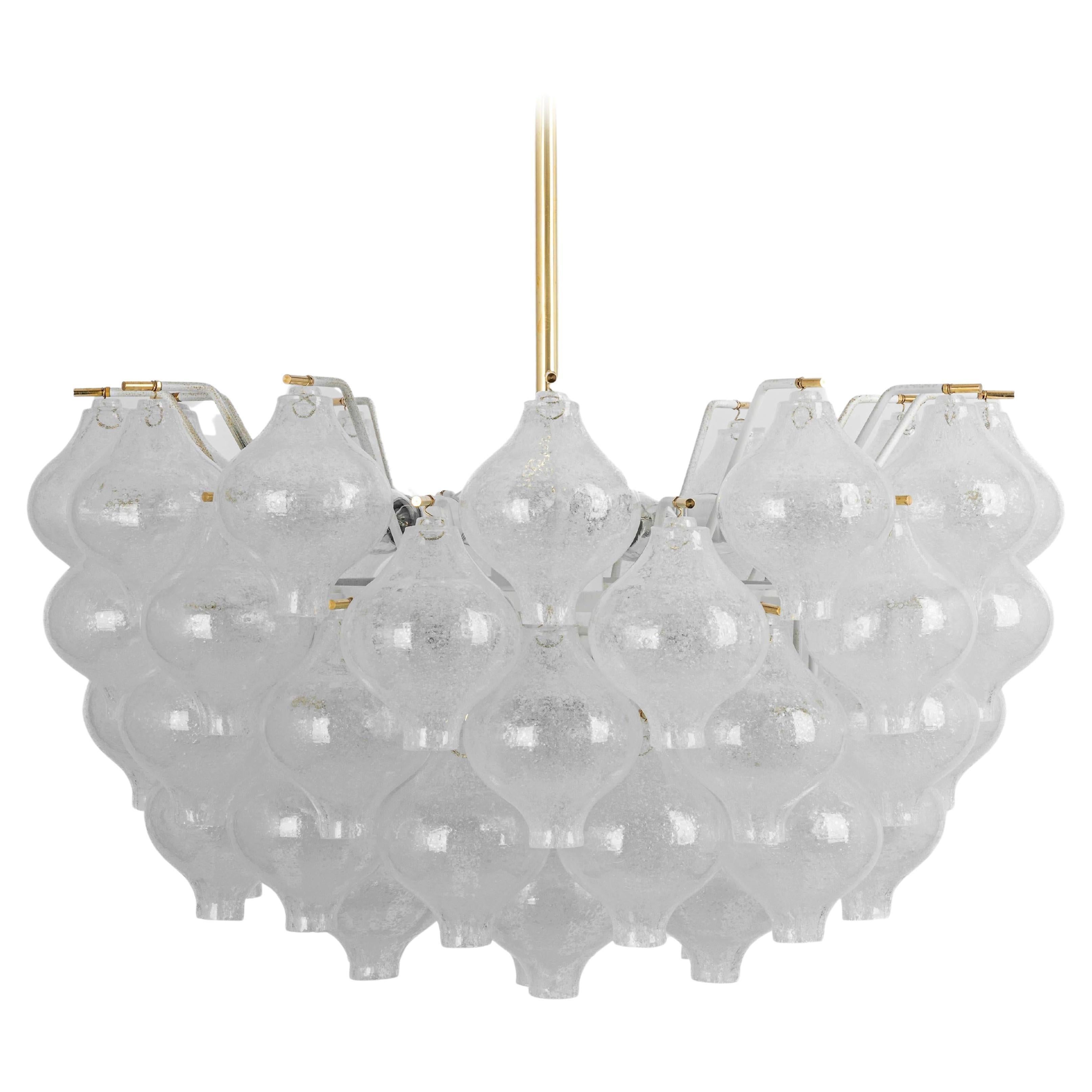 A large and fantastic light fixture model Tulipan 61 HL by J.T. Kalmar, Vienna, Austria, manufactured in midcentury, circa 1970 (late 1960s or early 1970s).
The name Tulipan derives from the tulip shaped hand blown bubble glasses. Each glass piece