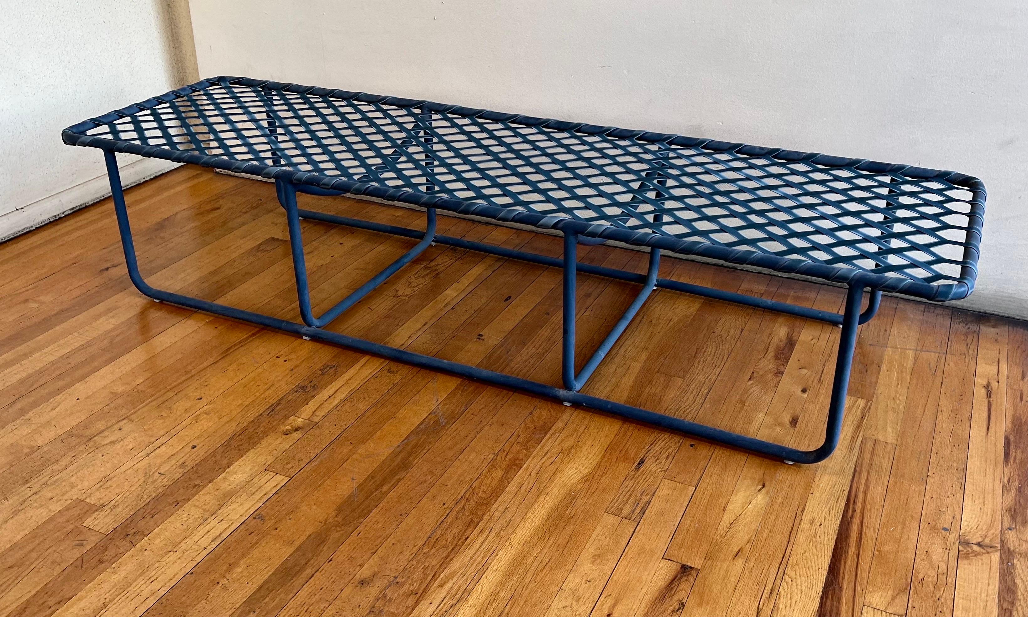 Rare Brown Jordan bench was designed by Tadao Inouye in the 1960s. All in its original condition a hard-to-find piece all original very clean original plastic feet and straps very light wear considering age. in Navy Blue Finish.
