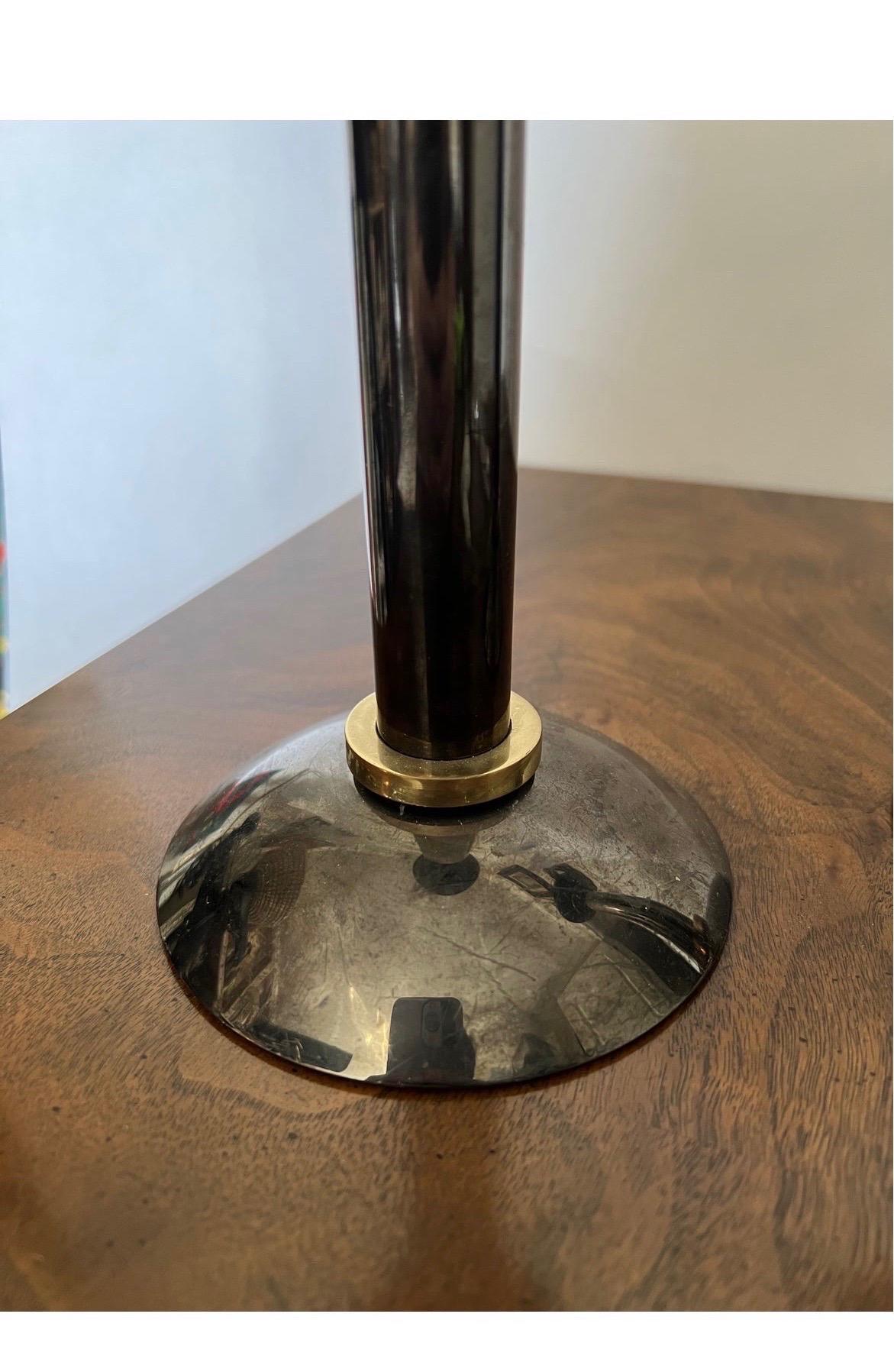 Pair, Karl Springer style gunmetal and brass candlesticks. 
Several identical pairs of candlesticks have been sold with the same attribution.