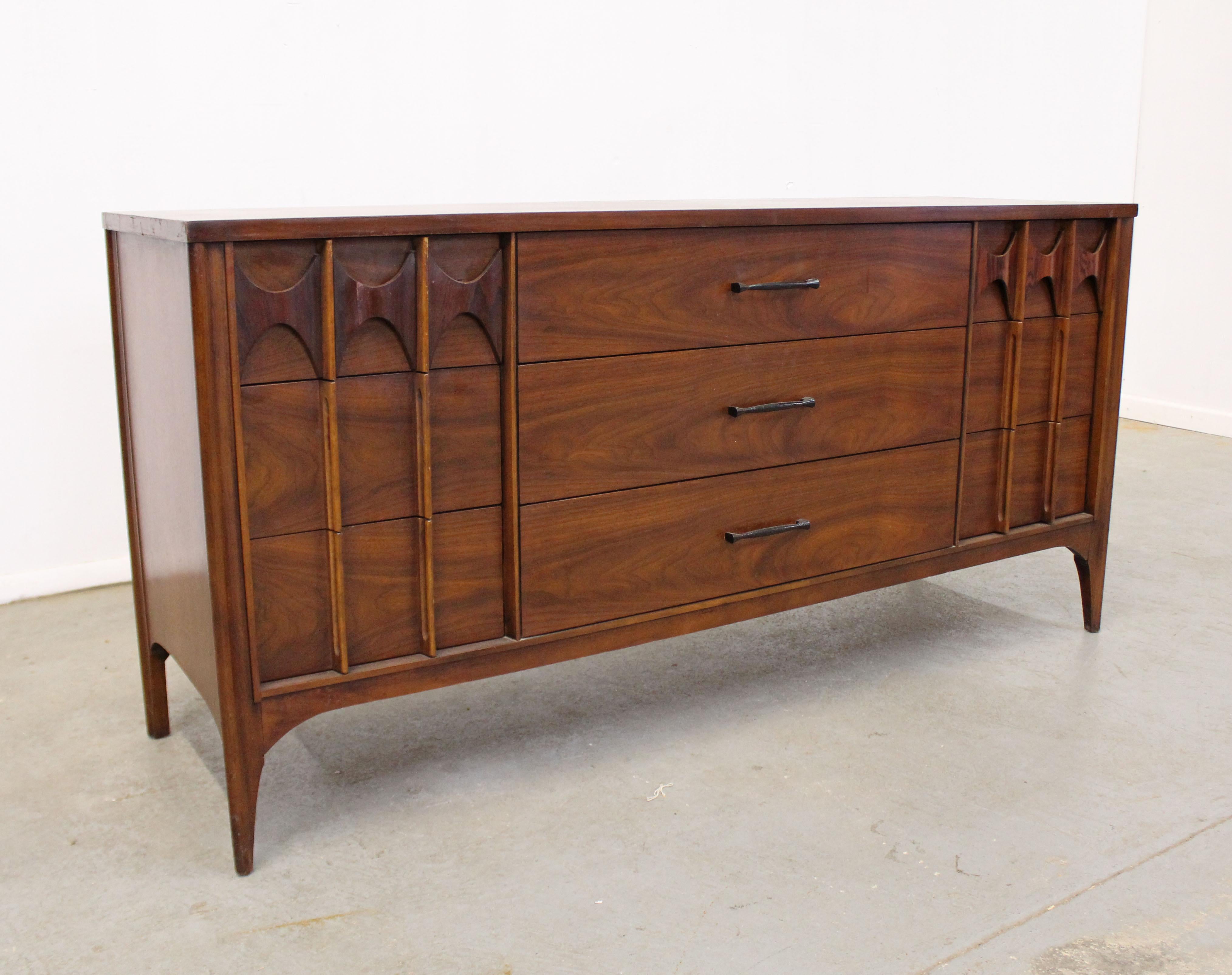 Offered is a vintage Mid-Century Modern credenza made by Kent Coffey 