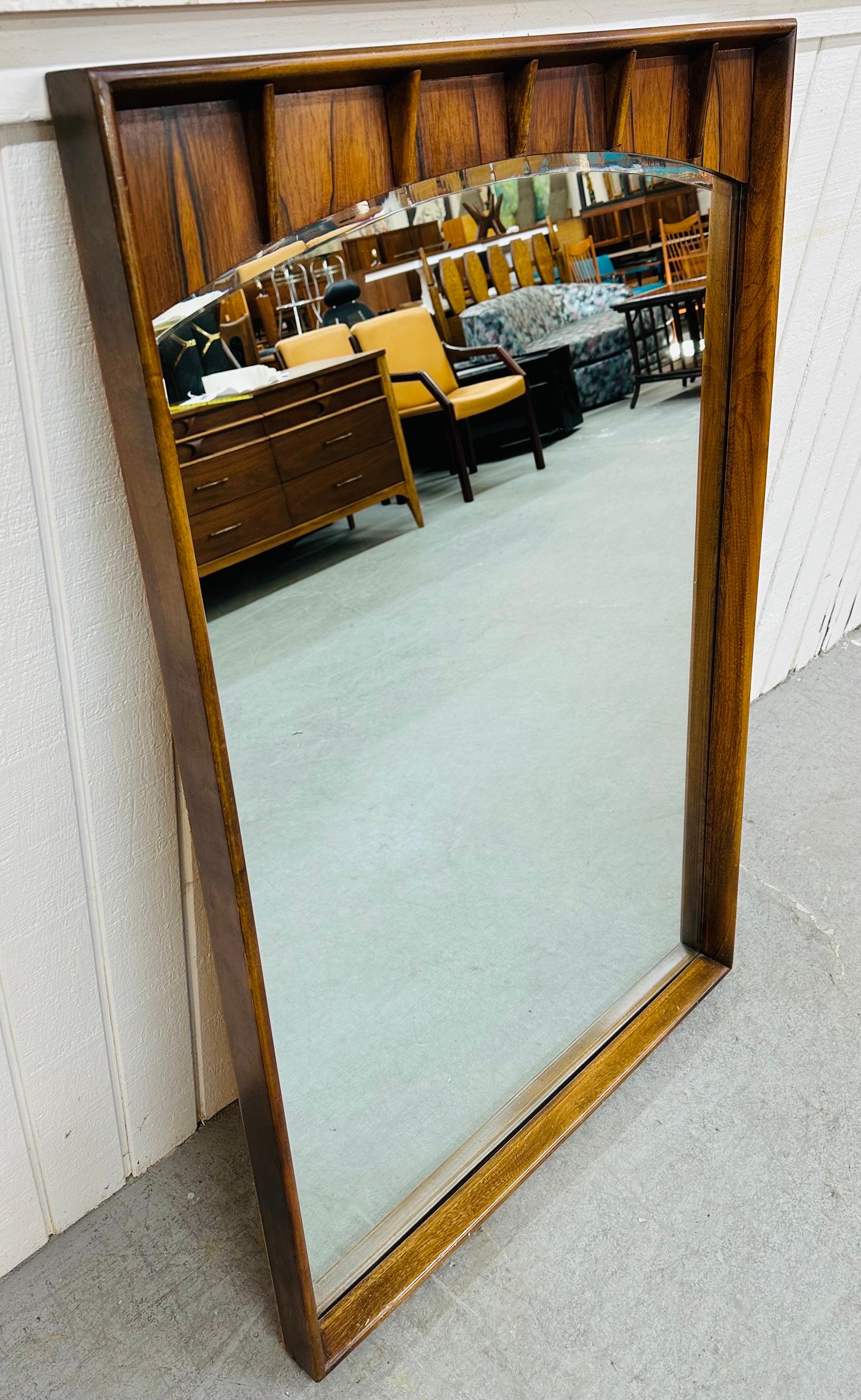 This listing is for a Mid-Century Modern Kent Coffey Perspecta Walnut & Rosewood Mirror. Featuring a straight line rectangular design, solid wood frame, and a beautiful walnut finish. This is an exceptional combination of quality and design by Kent