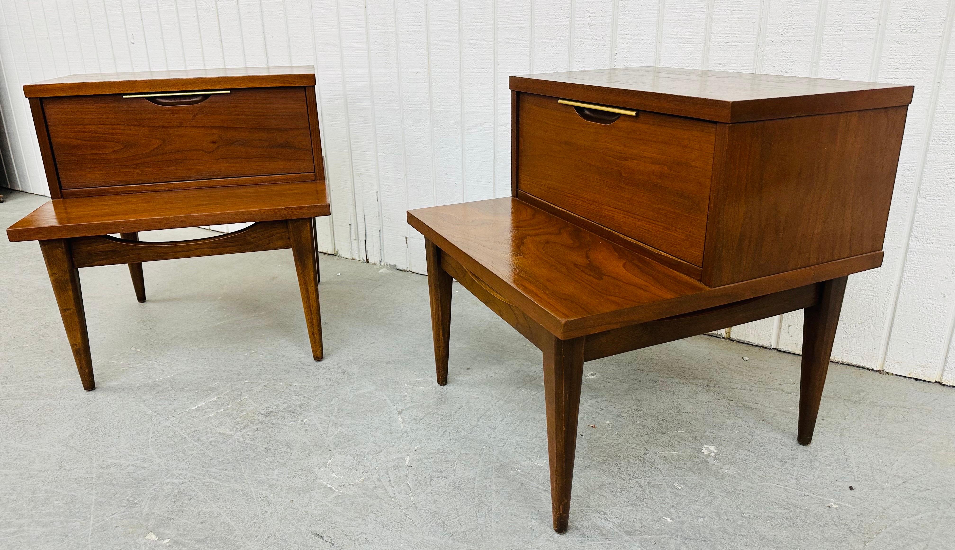 This listing is for a pair of Mid-Century Modern Kent Coffey Tableau Walnut Nightstands. Featuring a straight line step-table design, single drawer with recessed pull, modern legs, and a beautiful walnut finish. This is an exceptional combination of