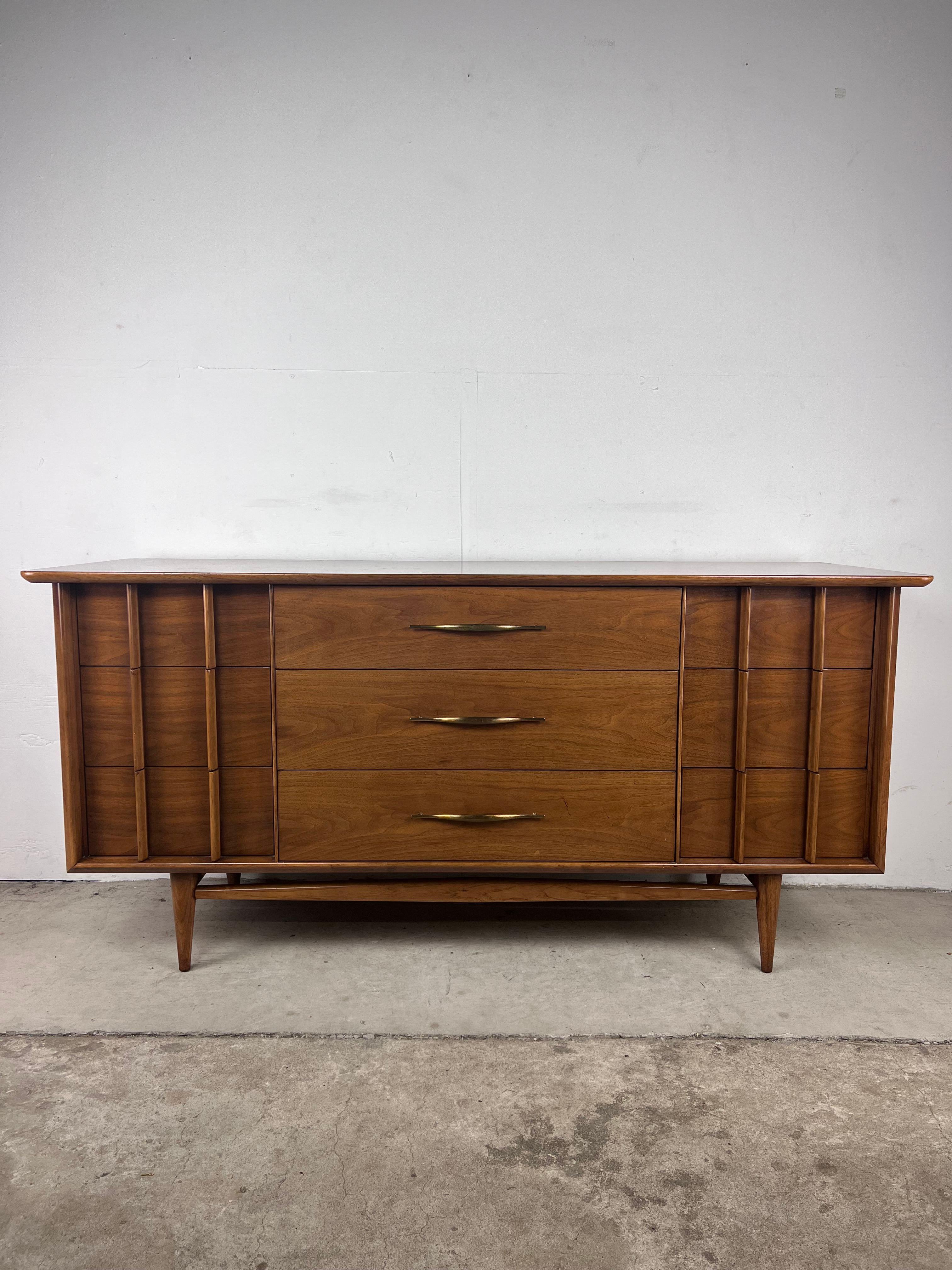 This Mid-Century Modern lowboy dresser from the 