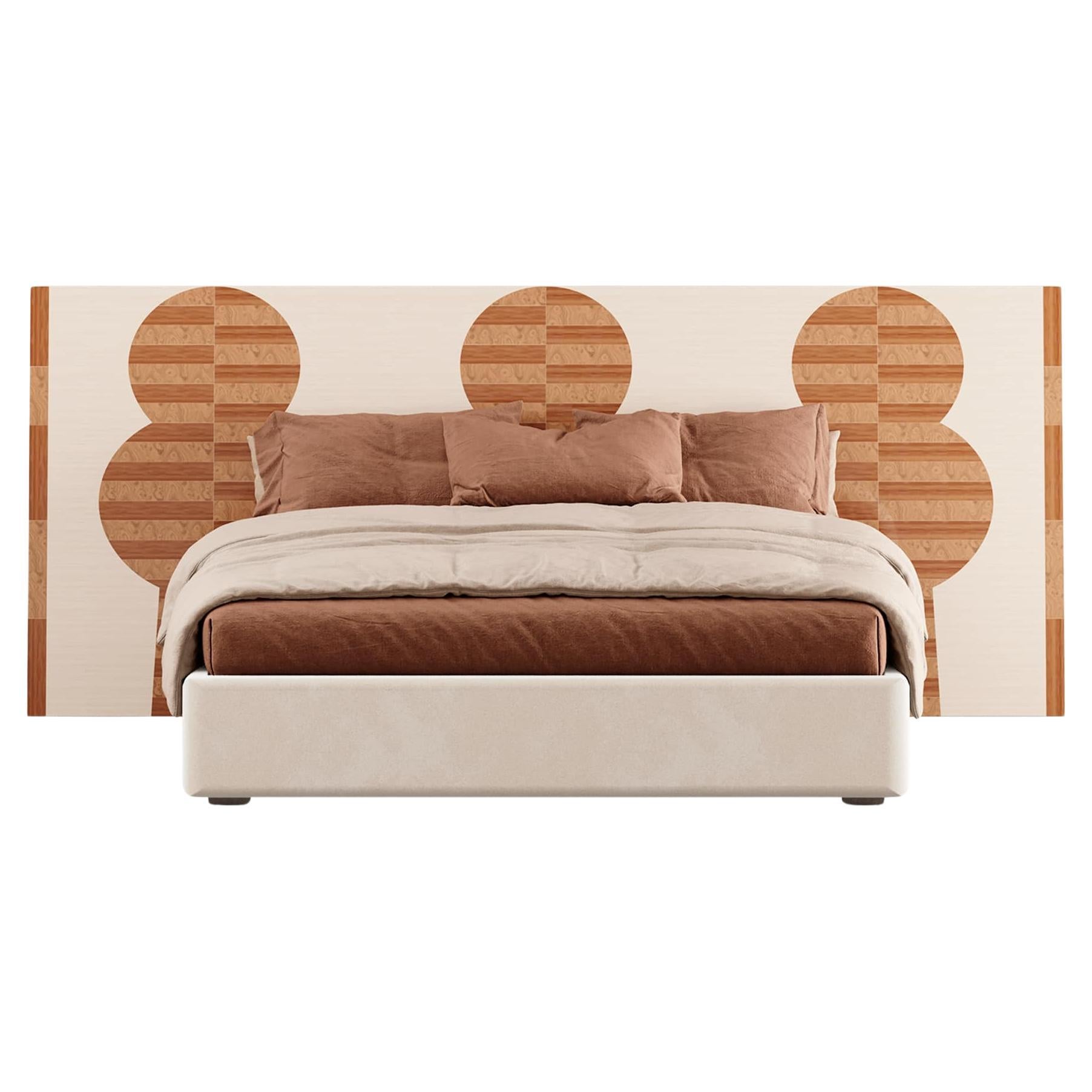 Moa King Headboard Bed is a tribute to mid-century modern design with a luxurious twist, perfect for elevating your bedroom decor. It features a rich wood headboard that exudes softness and refinement. This unique marquetry adds a touch of luxury