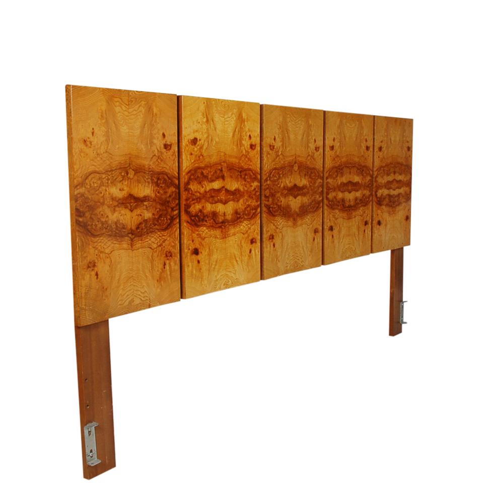 A lovely modern design king size headboard attributed to Milo Baughman for Thayer Coggin. It features a five-panel design in bookmatched olive burl veneers. Absolutely stunning.