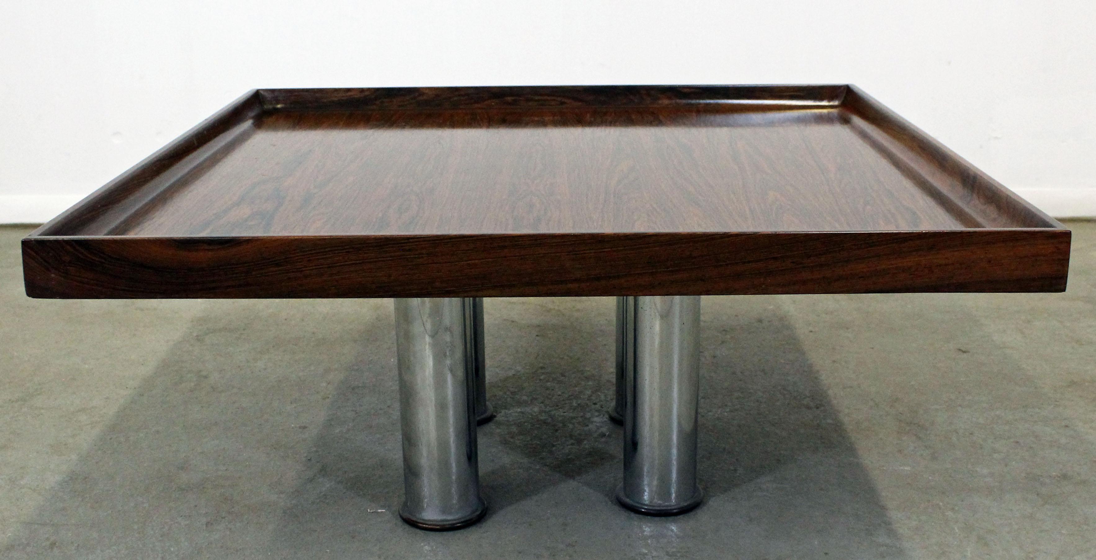 Offered is a Mid-Century Modern rosewood coffee or end table by Knoll. Features a square top and four chrome legs. In excellent condition its age, shows some slight wear (patina on chrome, minor surface wear-see photos). It is unsigned. A great