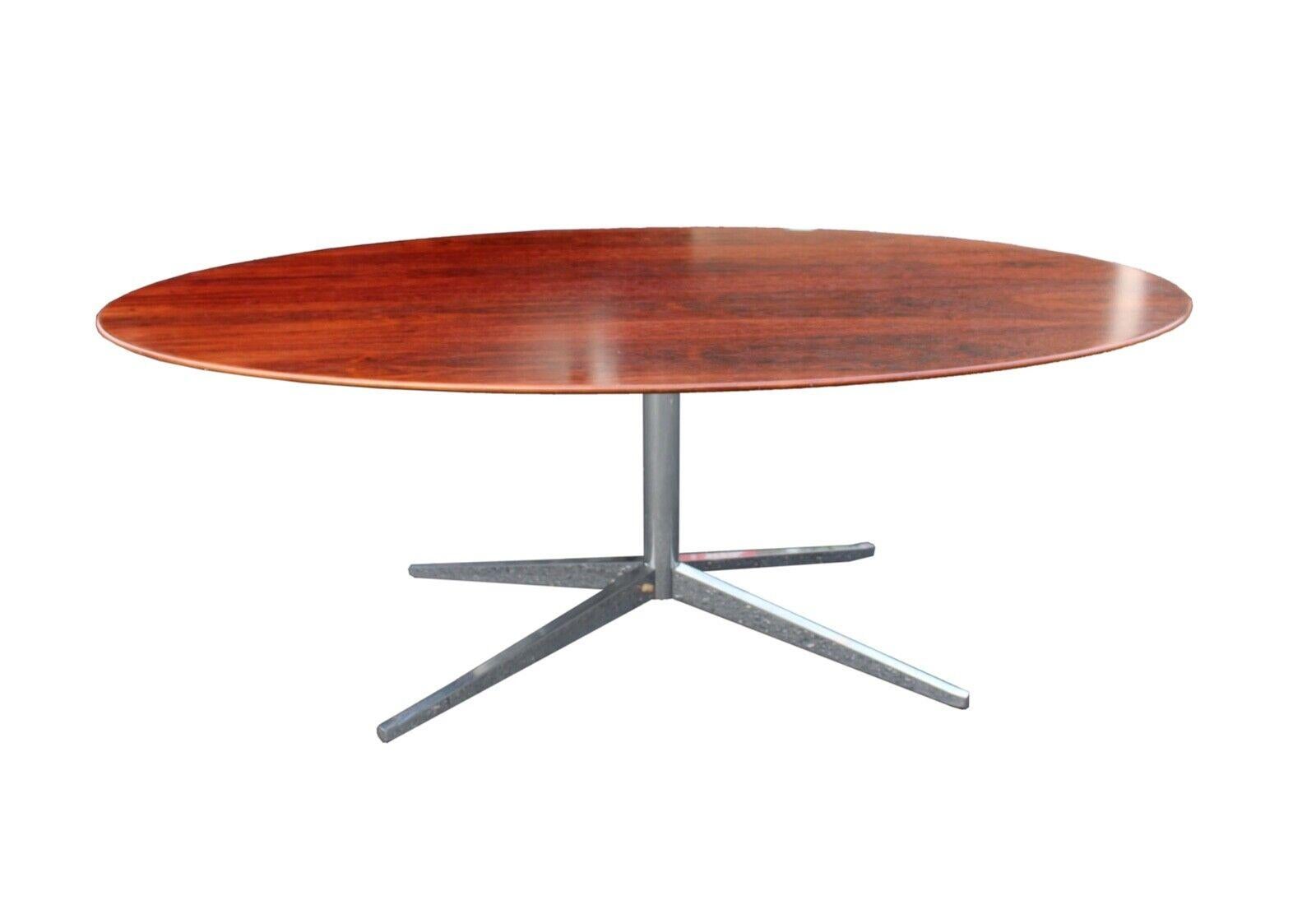 This gorgeous Knoll rosewood oval table at 78