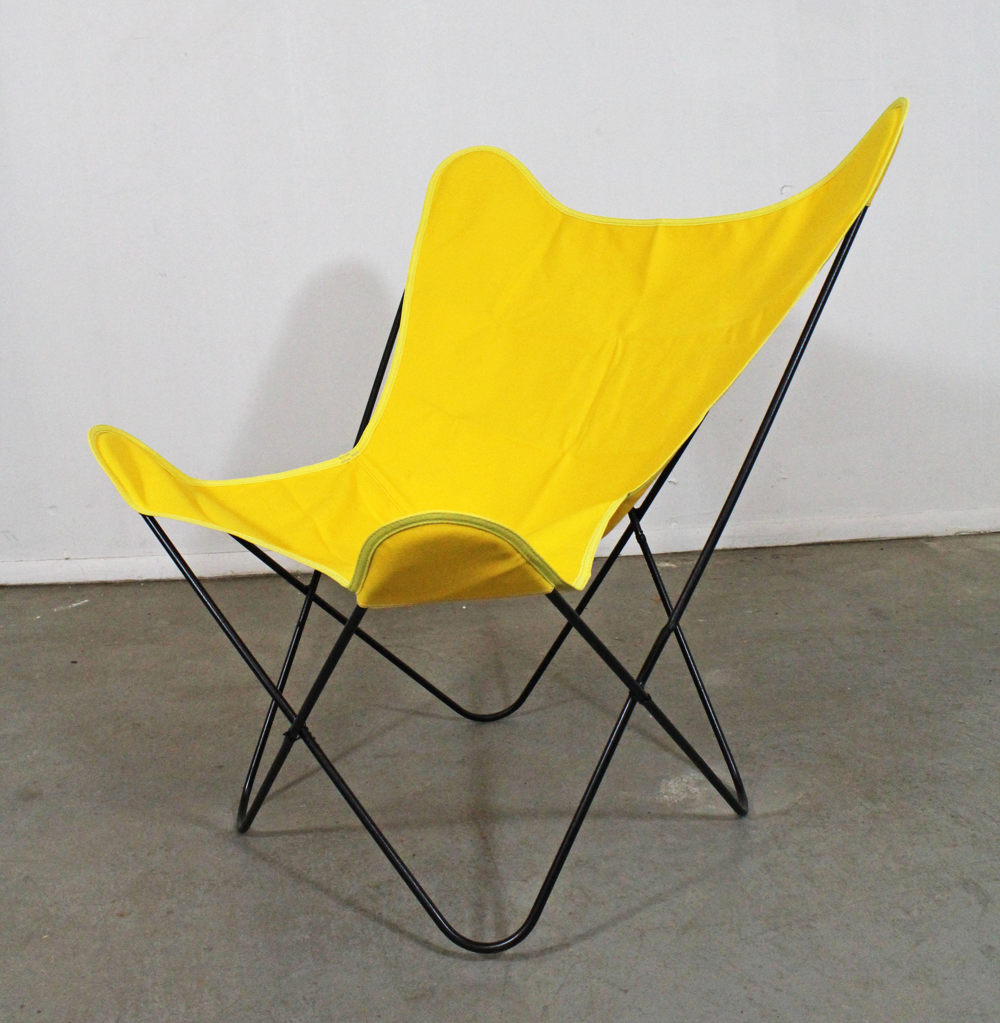 Midcentury Danish modern welded iron butterfly chair

Offered is a welded iron 'Butterfly' chair, similar to the style of Knoll. It is in good condition, has been repainted and has a new cotton cover. It is unsigned. This chair came out of a local