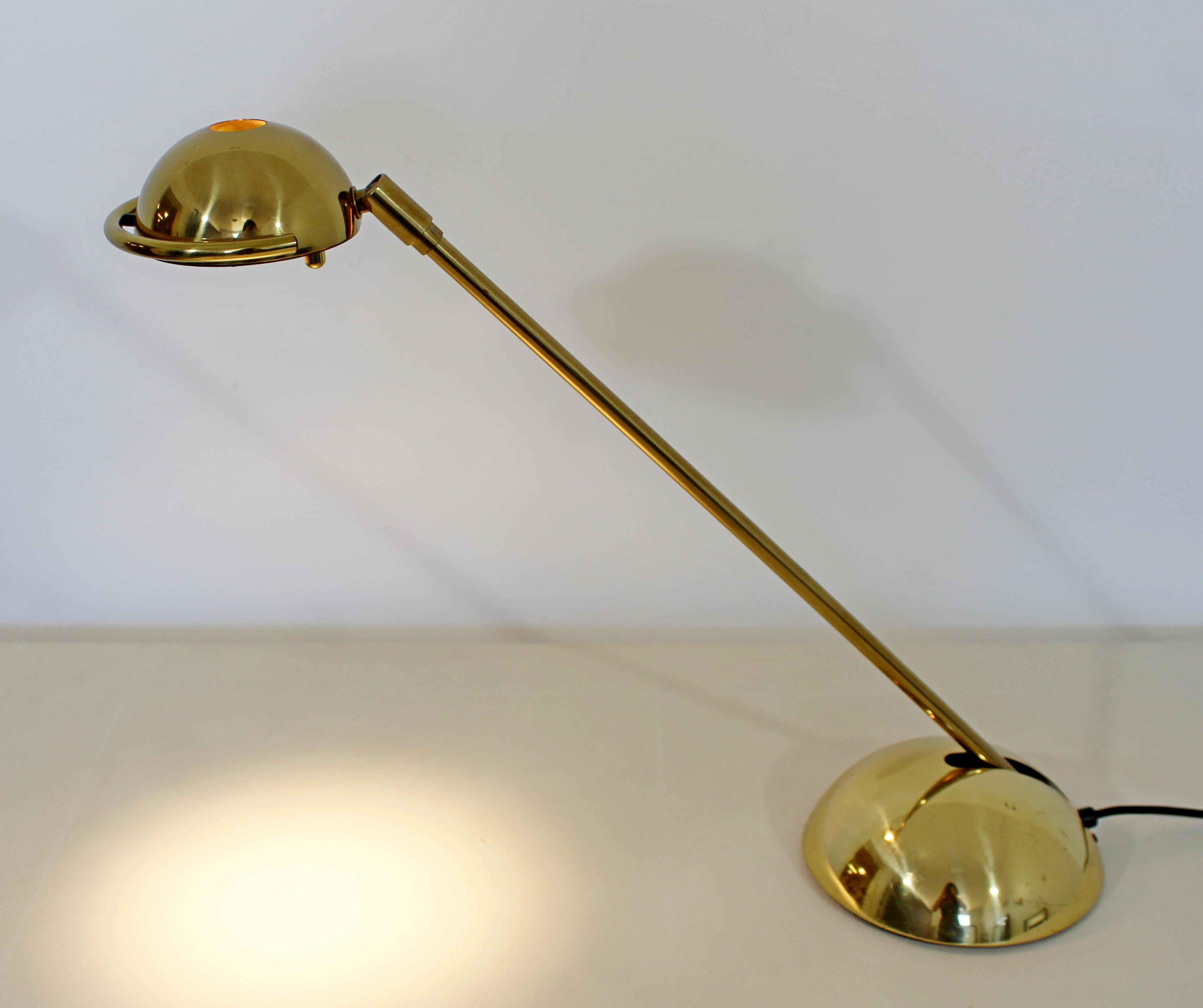 For your consideration is a gorgeous, adjustable brass reading table lamp, inscribed Koch & Lowy, circa 1970s. In very good vintage condition, with a patina to match its age. The dimensions are 7