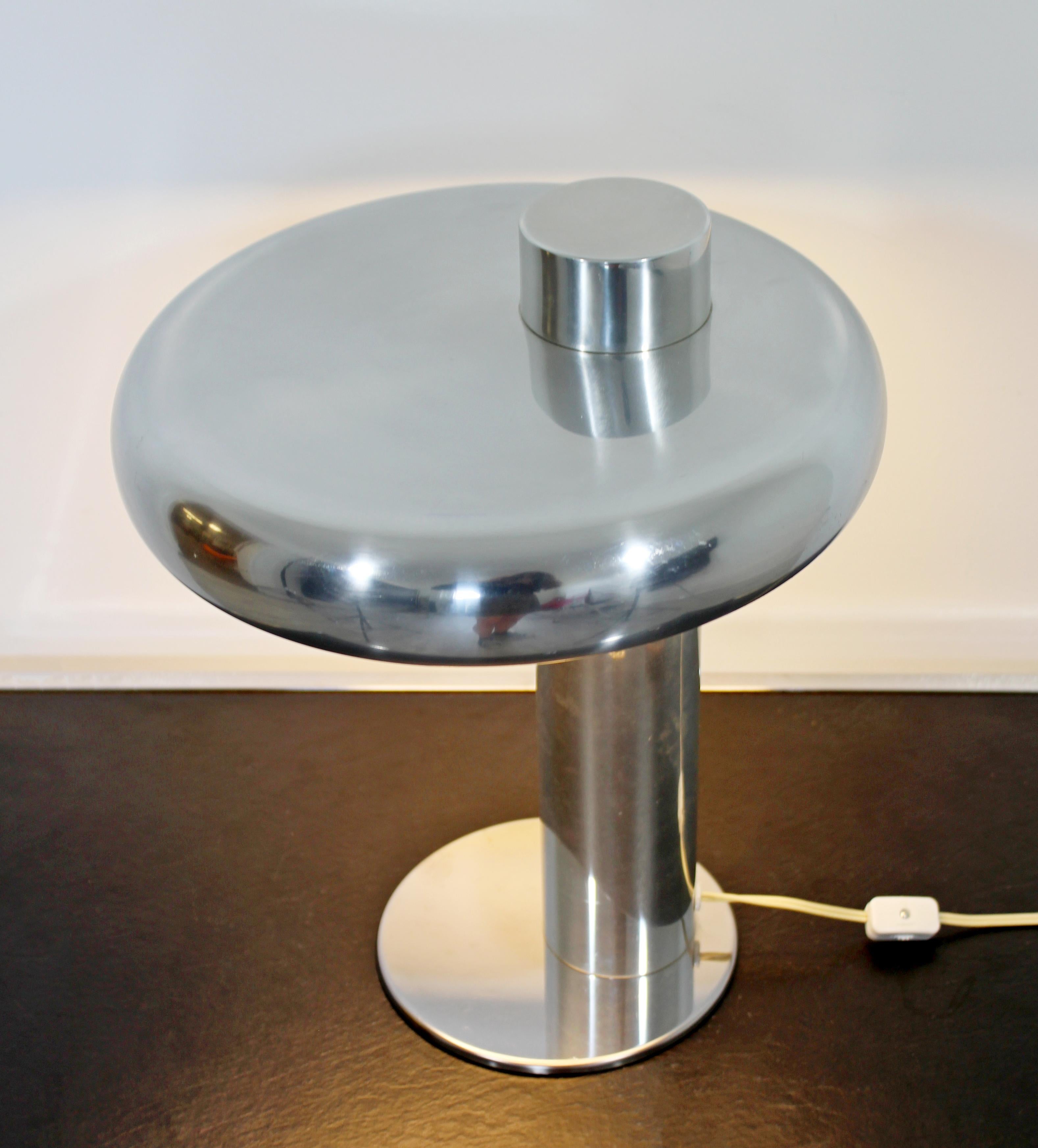 For your consideration is a chic, polished aluminum, reading table lamp, by Koch & Lowy, circa the 1970s. In very good vintage condition. The dimensions are 12