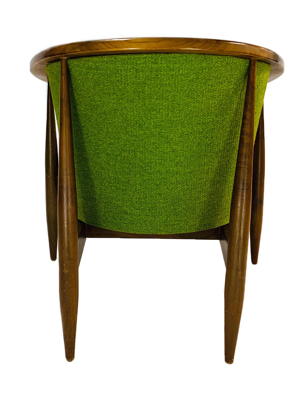 Mid-Century Modern Kodawood Barrel chair creates a barrel with its sleek minimal Kodawood frame recently reupholstered in green fabric.