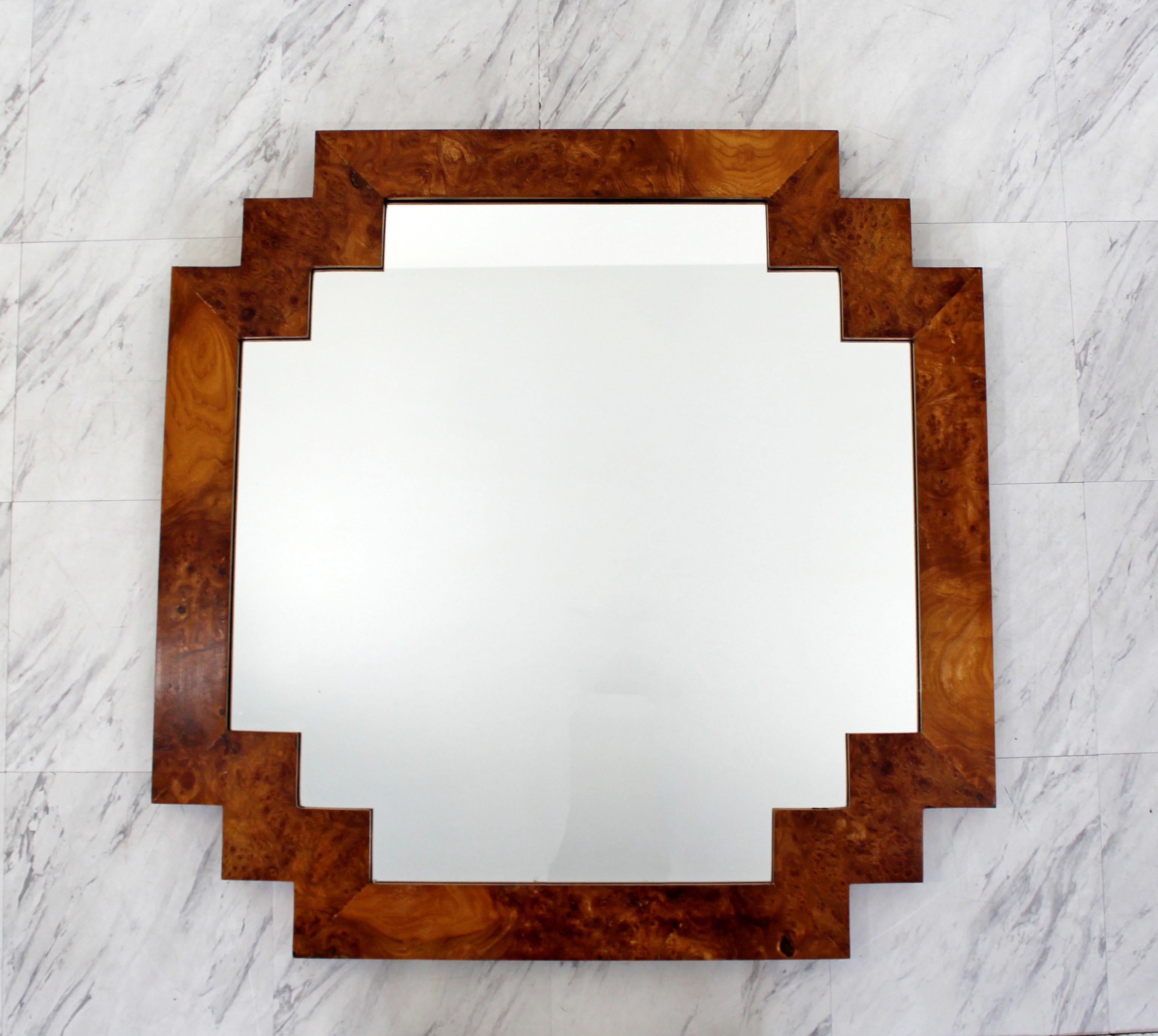 For your consideration is a fabulous, hanging wall mirror, made of burl wood, by La Barge, circa 1970s. In excellent condition. The dimensions are 36