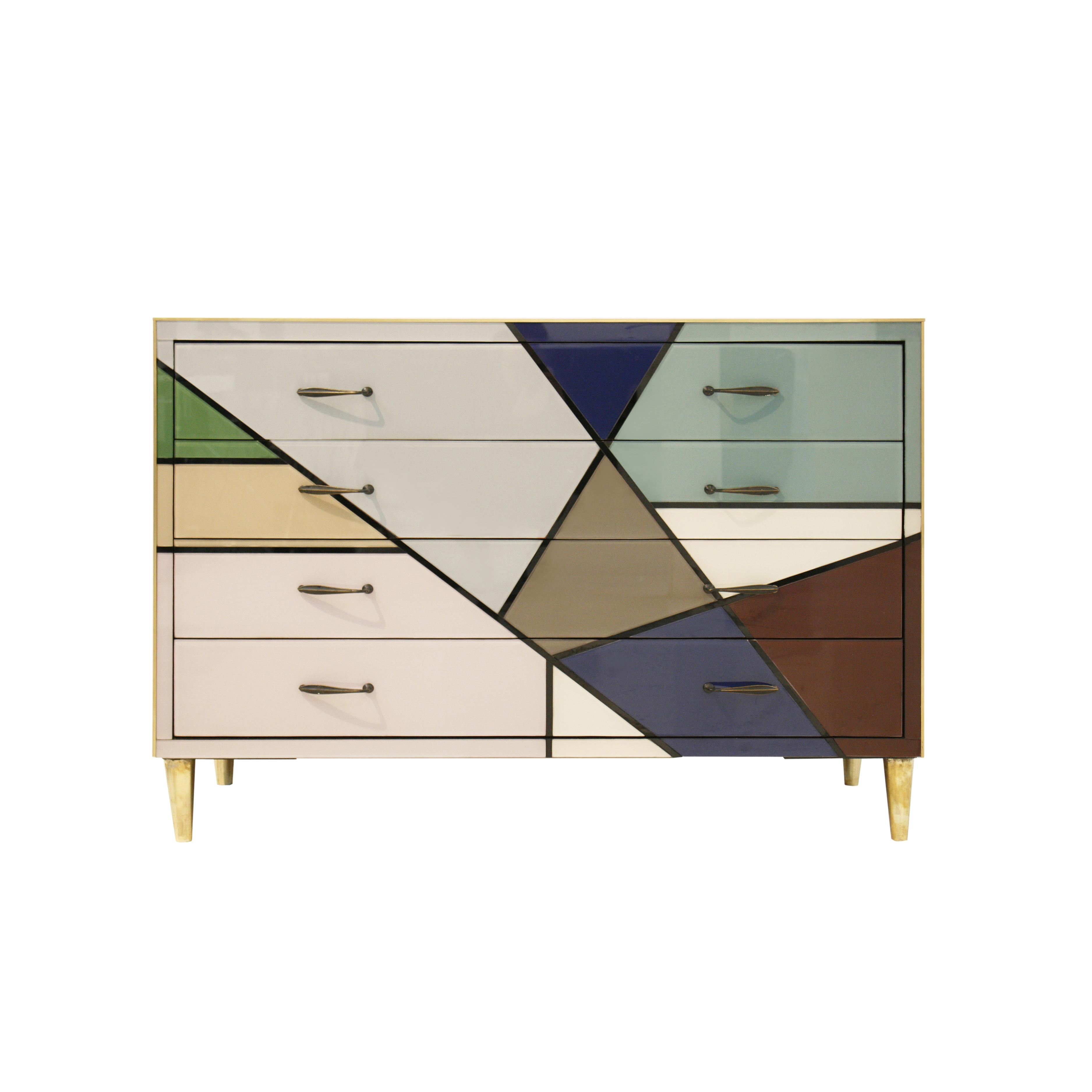 Beautiful chest of drawers designed by L.A. Studio. Made of solid wood structure from the 1950s and covered in Murano soft colored glass. Composed of four drawers with brass handles and legs. A stunning statement for a room.

Our main target is
