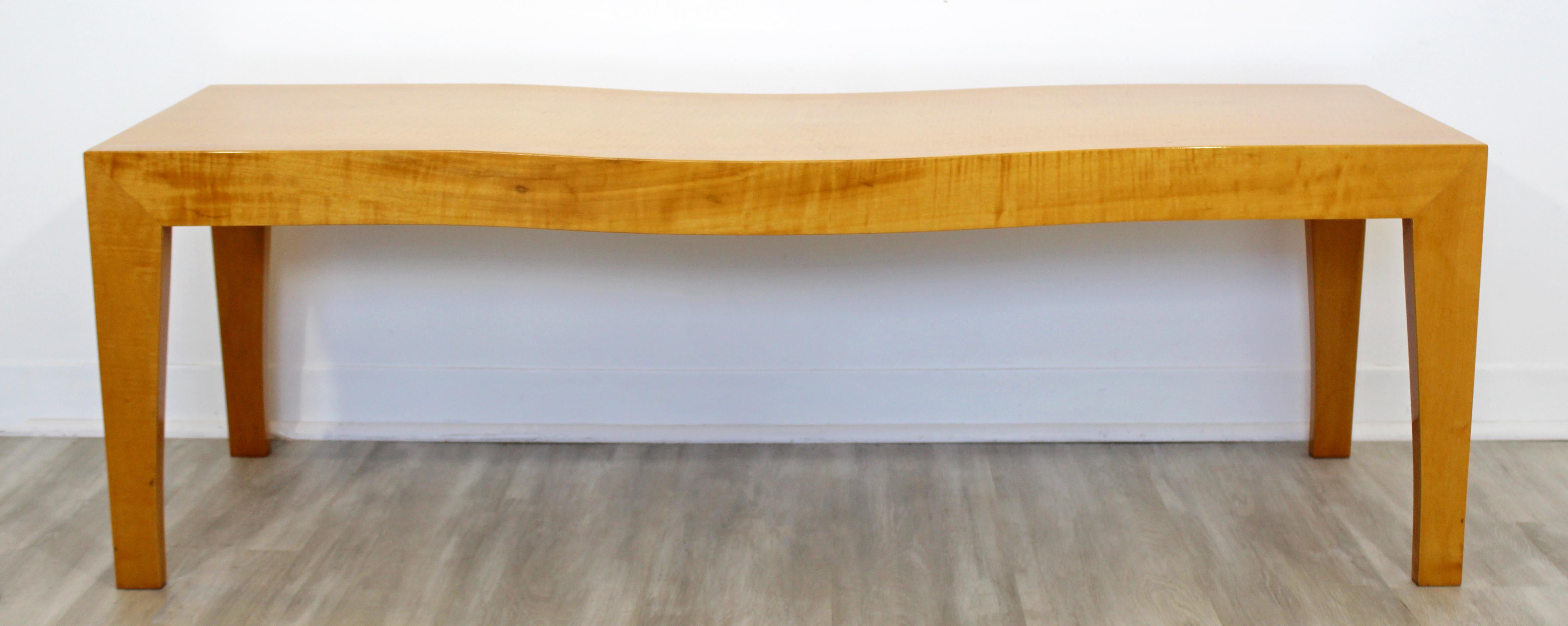 For your consideration is a sensational, three-seat wave bench, made of lacquered maple, circa 1990s. In excellent condition. The dimensions are 54