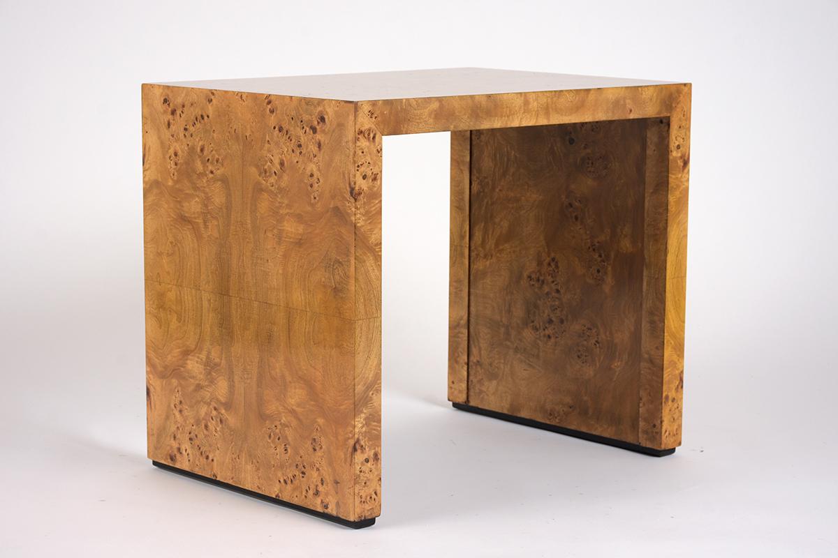 This Mid-Century Modern burled side table has been professionally restored and newly stained a natural and ebonized color details with a lacquered finish. The table has the beautiful Mappa burl veneer in great condition. This modern Mappa burled
