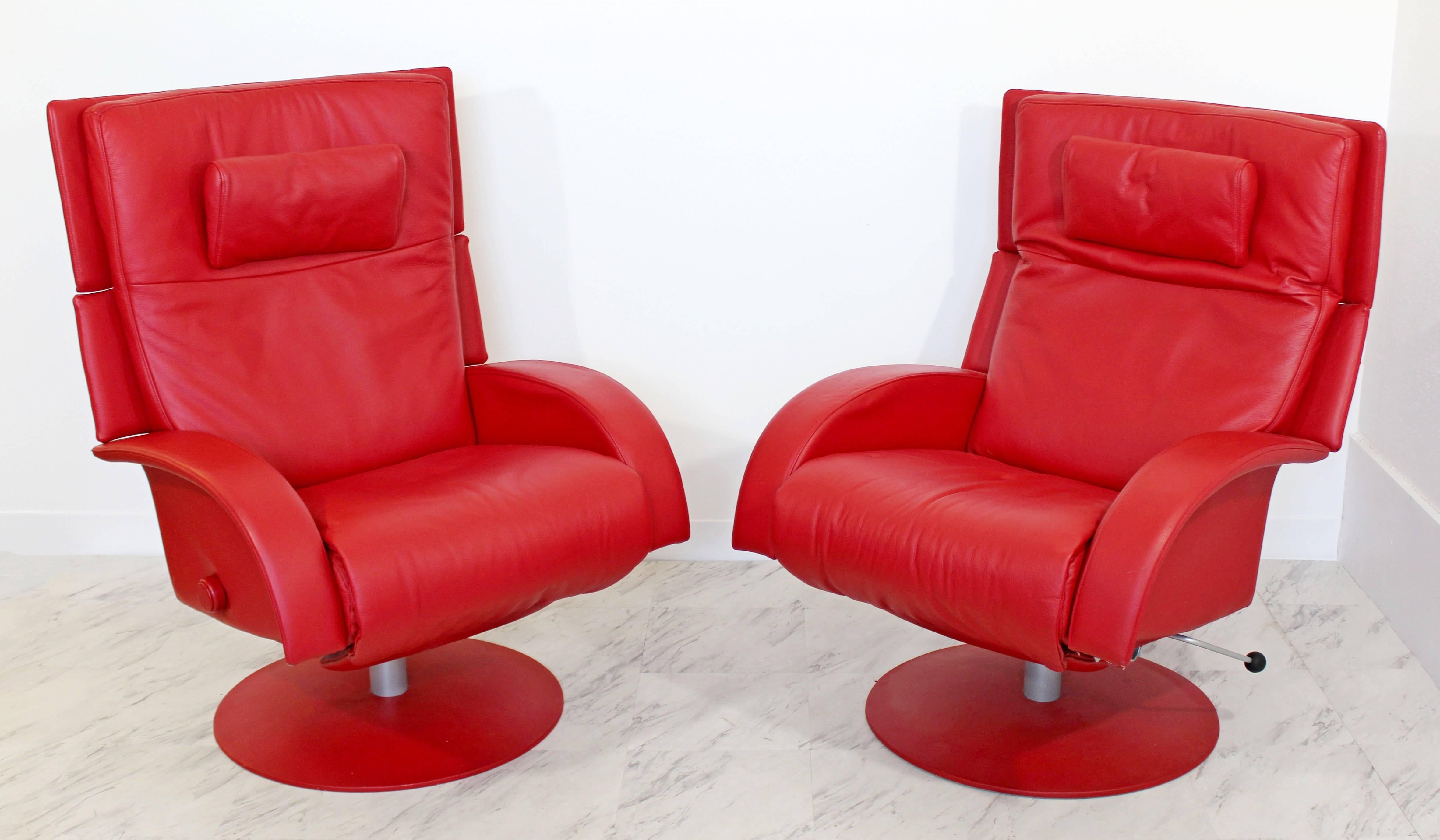 For your consideration is an utterly phenomenal pair of red leather, reclining lounge chairs by Lafer. The back both reclines and folds in and the foot rests pulls out and folds in. In excellent condition. The dimensions are 30
