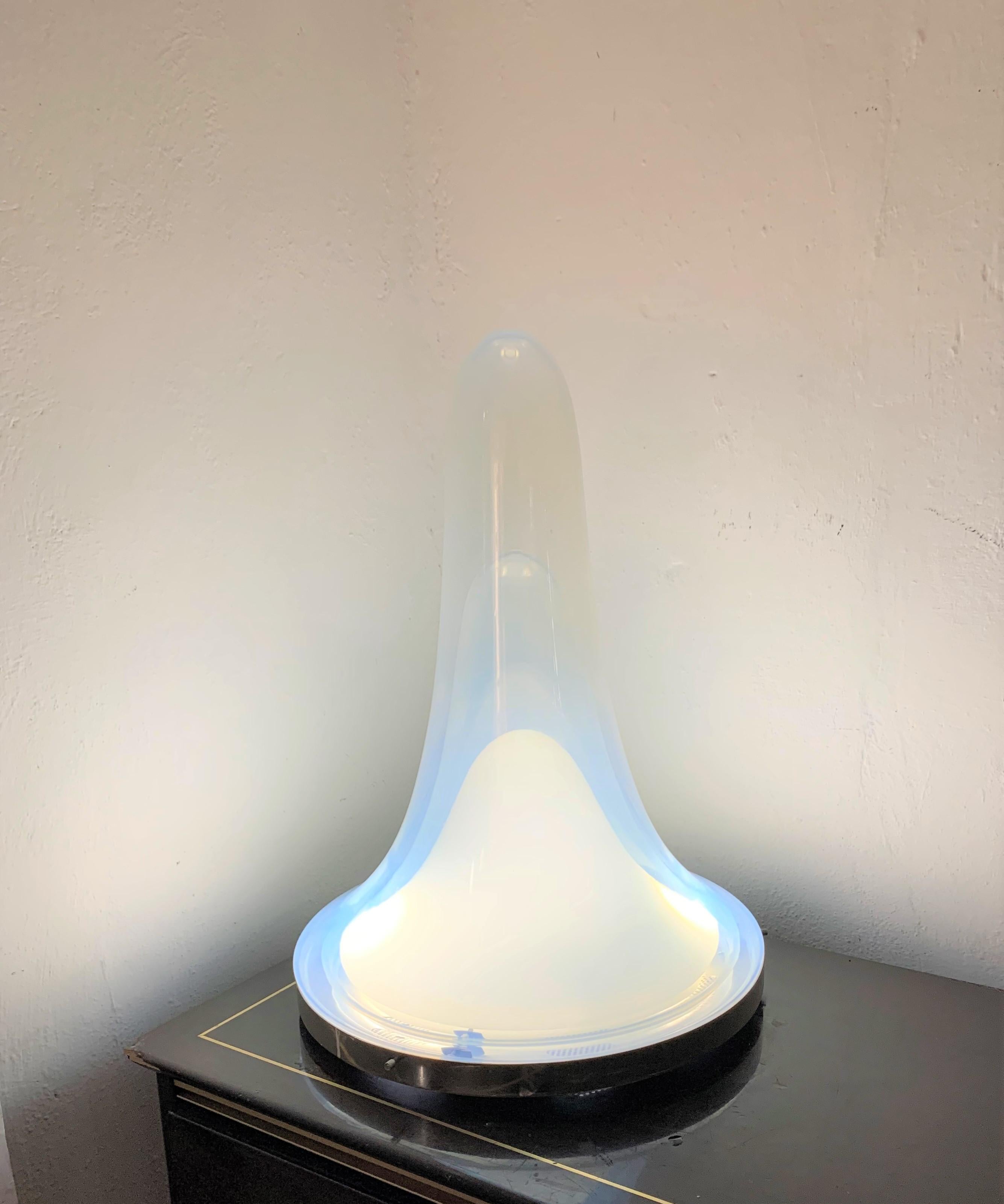 Beautiful Mid-Century Modern lamp by Mazzega, designed by Carlo Nason, circa 1960, in opalescent and opaline hand blown Murano glass.
This lamp consist of three separate pieces of glass and can be used as a table or ceiling lamp as preferred.
This