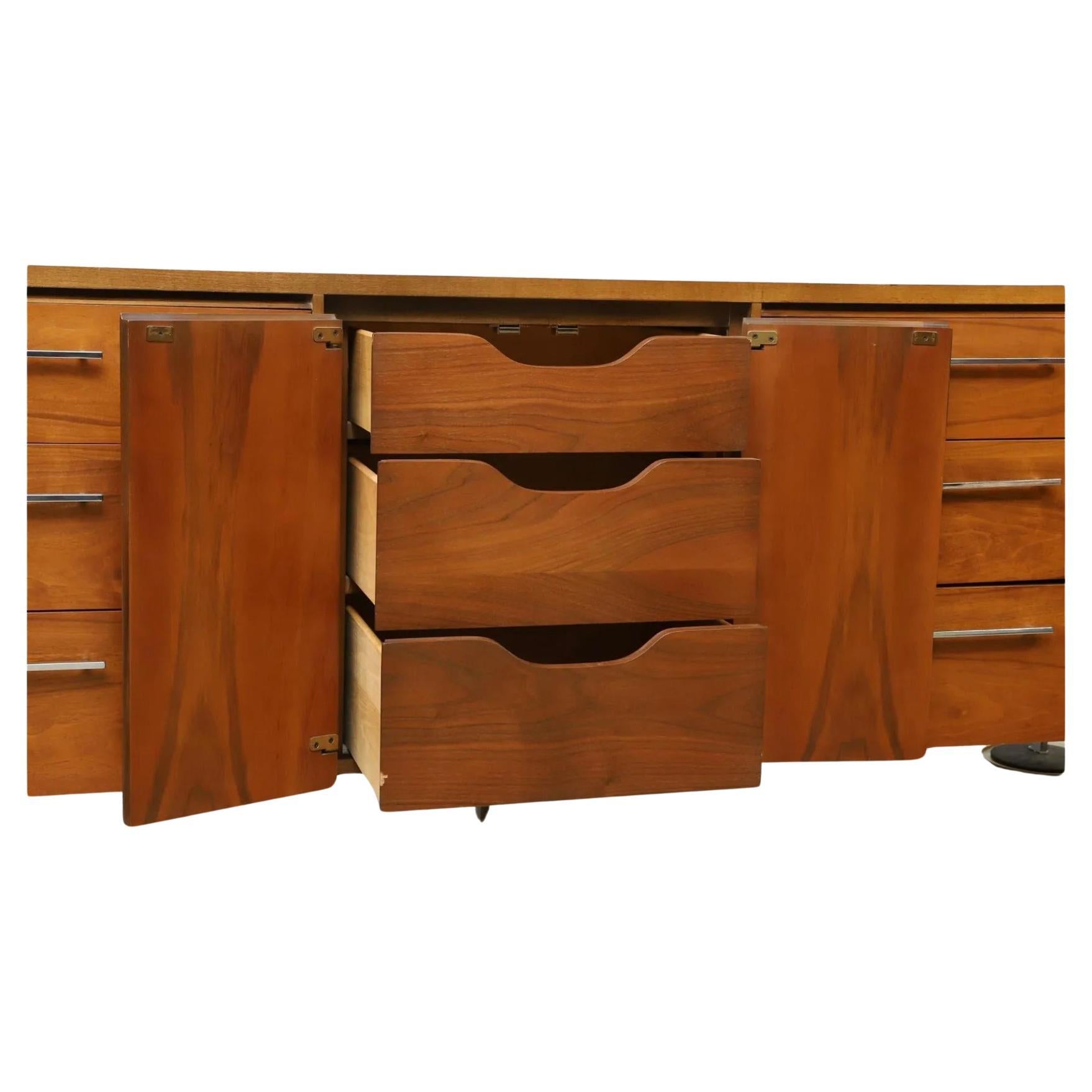 Mid Century Modern Lane 9 Drawer 2 door Walnut Credenza with Chrome legs In Good Condition For Sale In BROOKLYN, NY