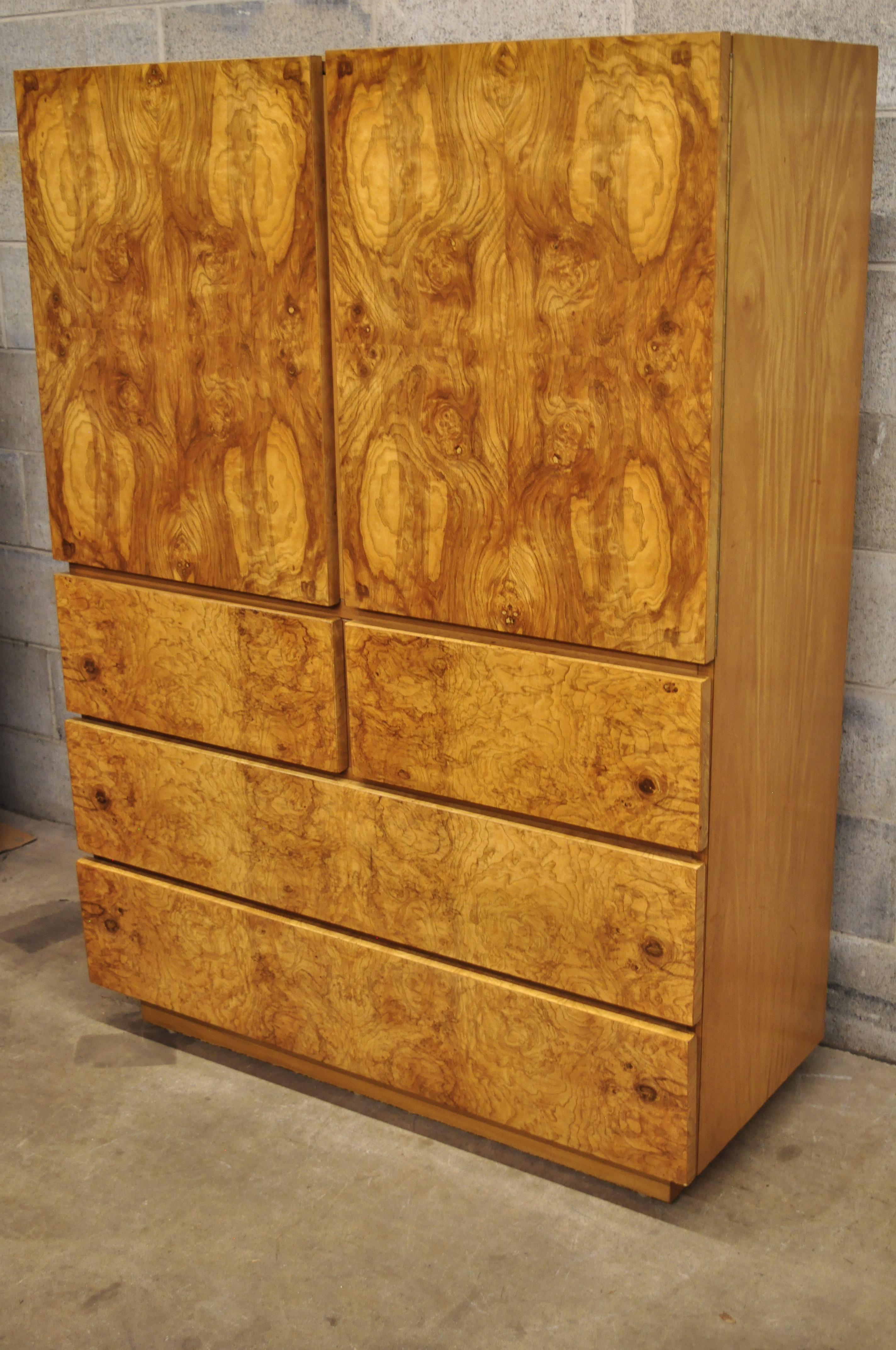 Mid-Century Modern Lane Art Deco burl wood Baughman style armoire chest dresser. Item features beautiful wood grain, 2 swing doors, original stamp, 5 dovetailed drawers, clean modernist lines, quality American craftsmanship, circa mid-20th century.