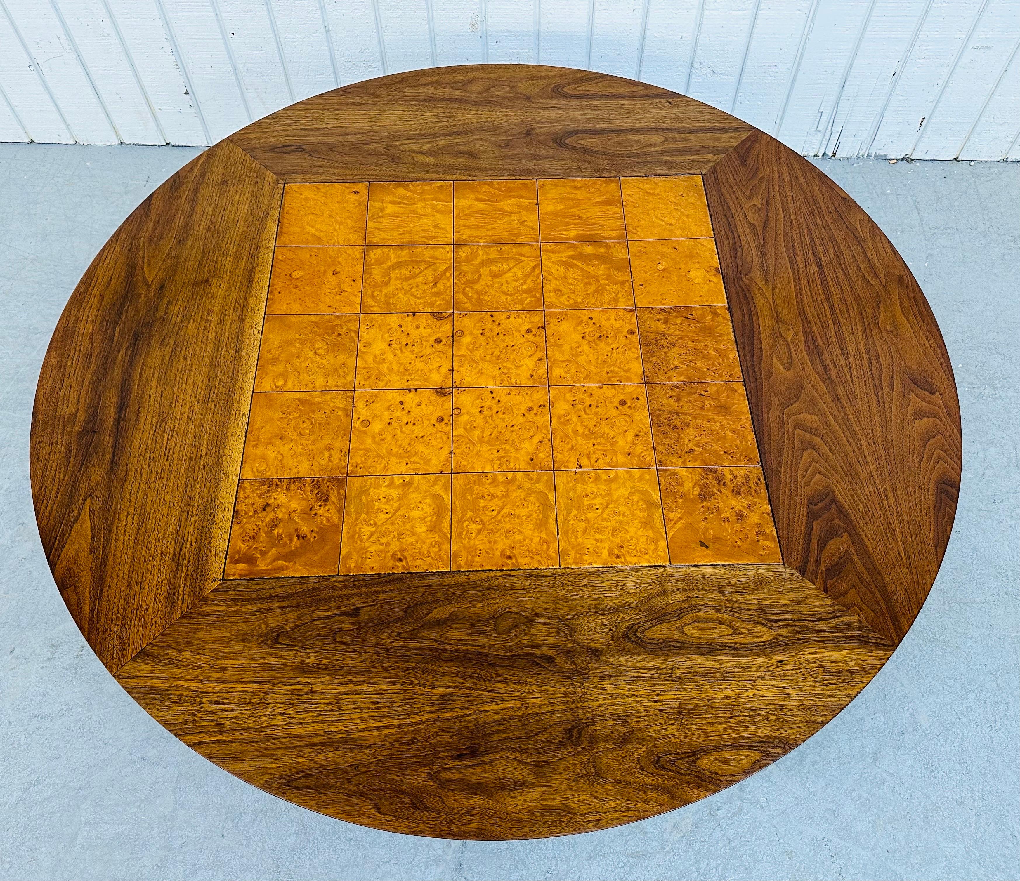 This listing is for a Mid-Century Modern Lane Round Burled Walnut Coffee Table. Featuring a beautiful round two-tone walnut top, square burled center, and a black lacquered base. This is an exceptional combination of quality and modern design by