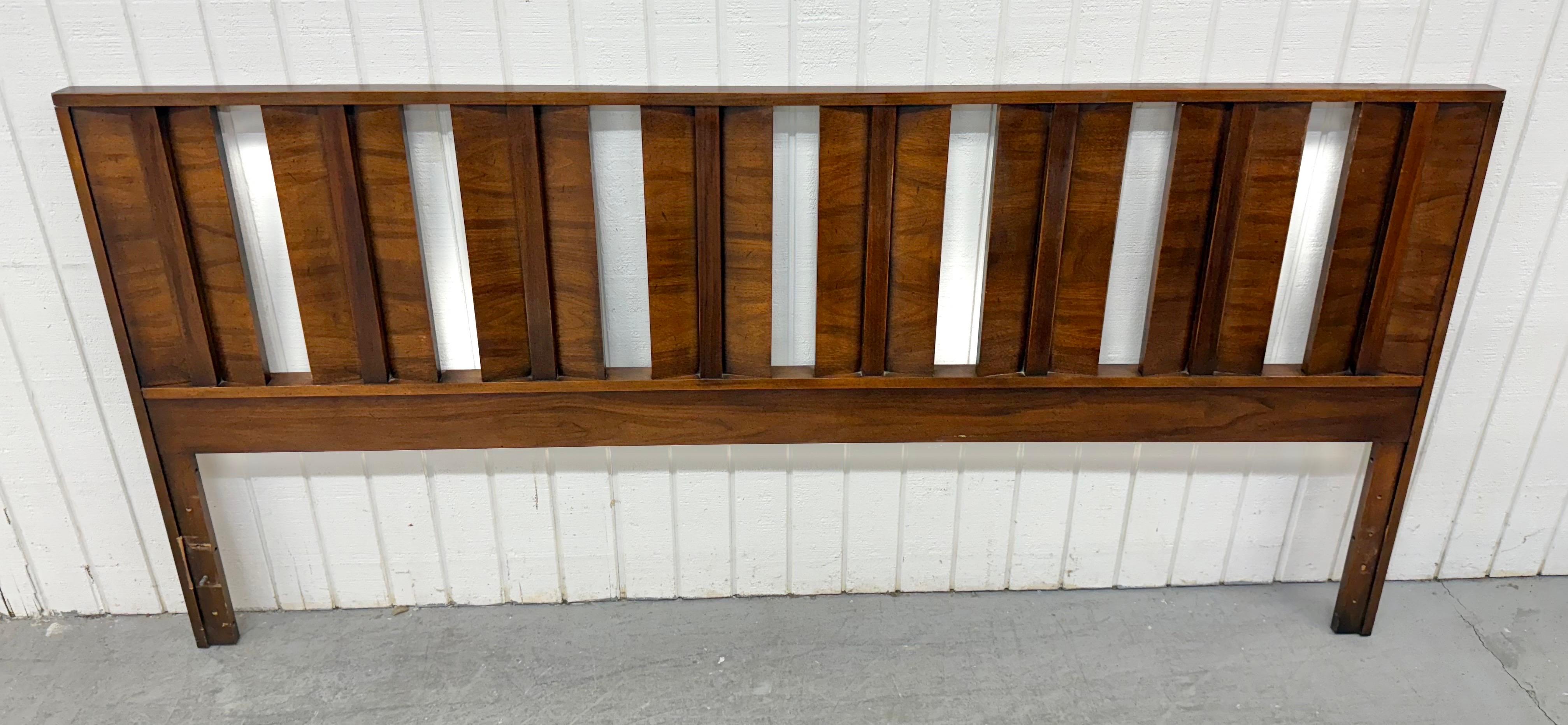 This listing is for a Mid-Century Modern Lane King Size Walnut Headboard. Featuring a straight line brutalist design, setup to take a king size metal frame, and a beautiful walnut finish. This is an exceptional combination of quality and design by