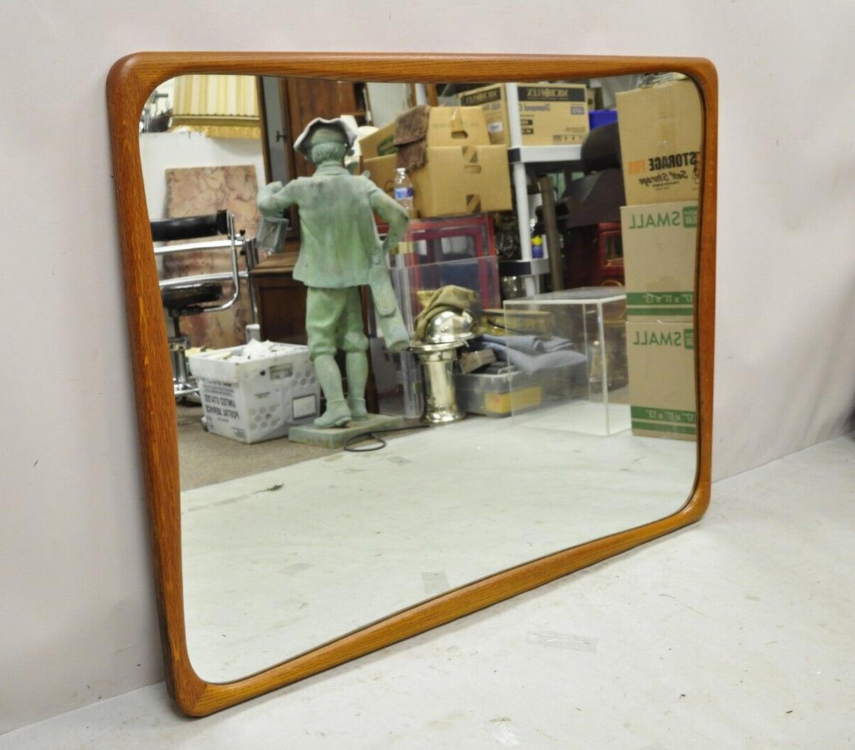 Mid-Century Modern lane perception sculpted Oak wood rectangular mirror. Item features beautiful wood grain, nicely carved details, serial number (see image 9), quality American craftsmanship, sleek sculptural form, circa Mid-20th Century.
