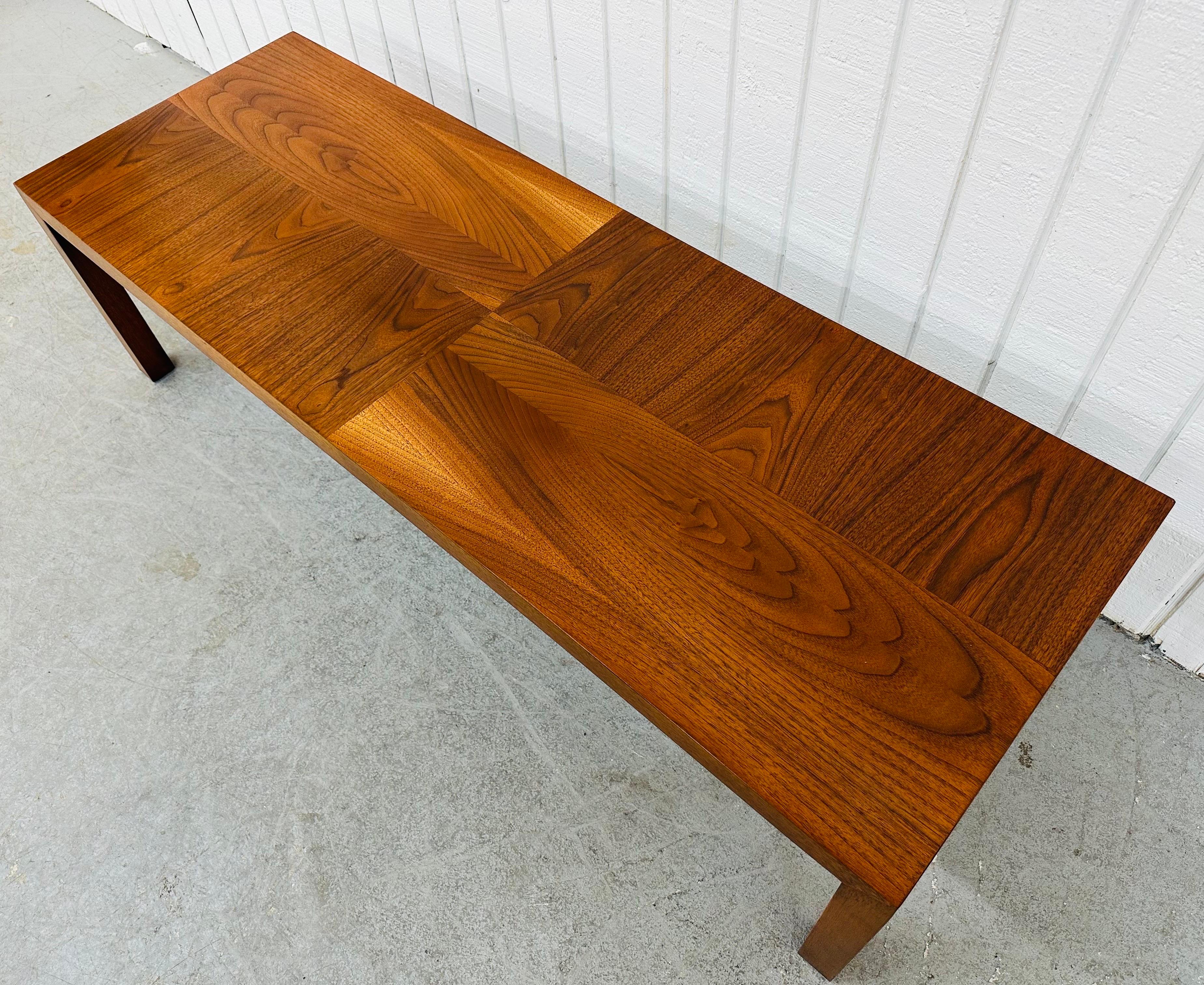 This listing is for a Mid-Century Modern Lane Rectangular Walnut Coffee Table. Featuring a straight line design, rectangular top, modern legs, and a beautiful walnut finish. This is an exceptional combination of quality and design by Lane!