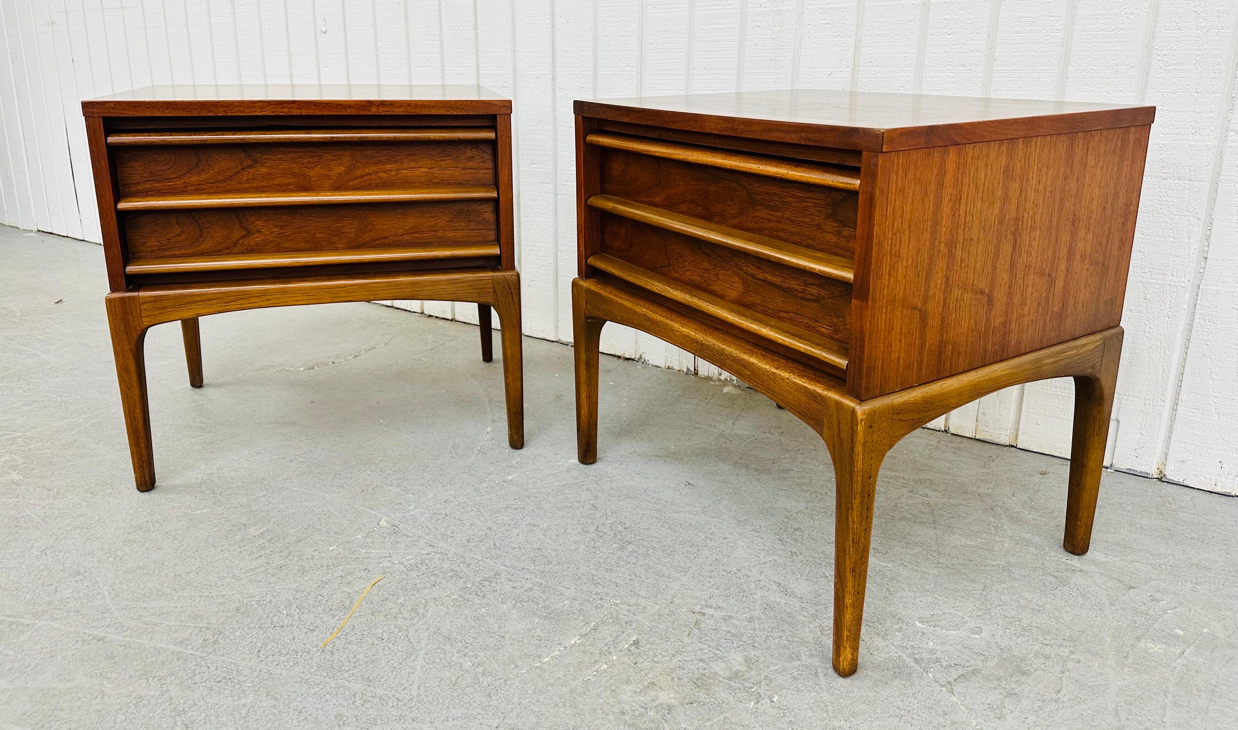 This listing is for a pair of Mid-Century Modern Lane Rhythm Walnut Nightstands. Featuring a straight line design, single drawer for storage, long modern legs, and a beautiful walnut finish. This is an exceptional combination of quality and design
