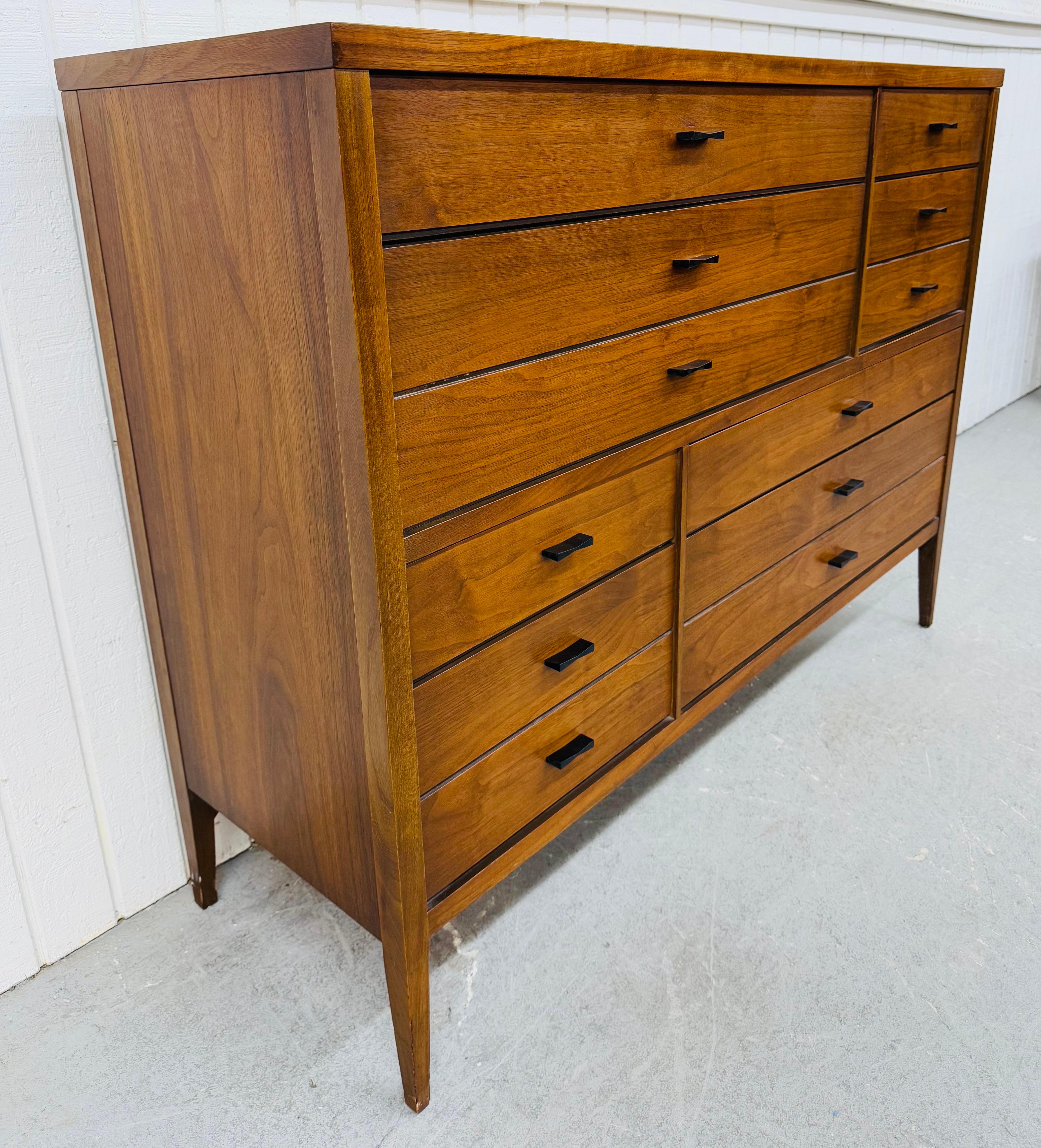 This listing is for a Mid-Century Modern Lane Tuxedo Walnut Magna High Chest. Featuring a straight line design, eight drawers for storage, original black hardware, modern legs, rosewood inlay on top, and a beautiful walnut finish. This is an