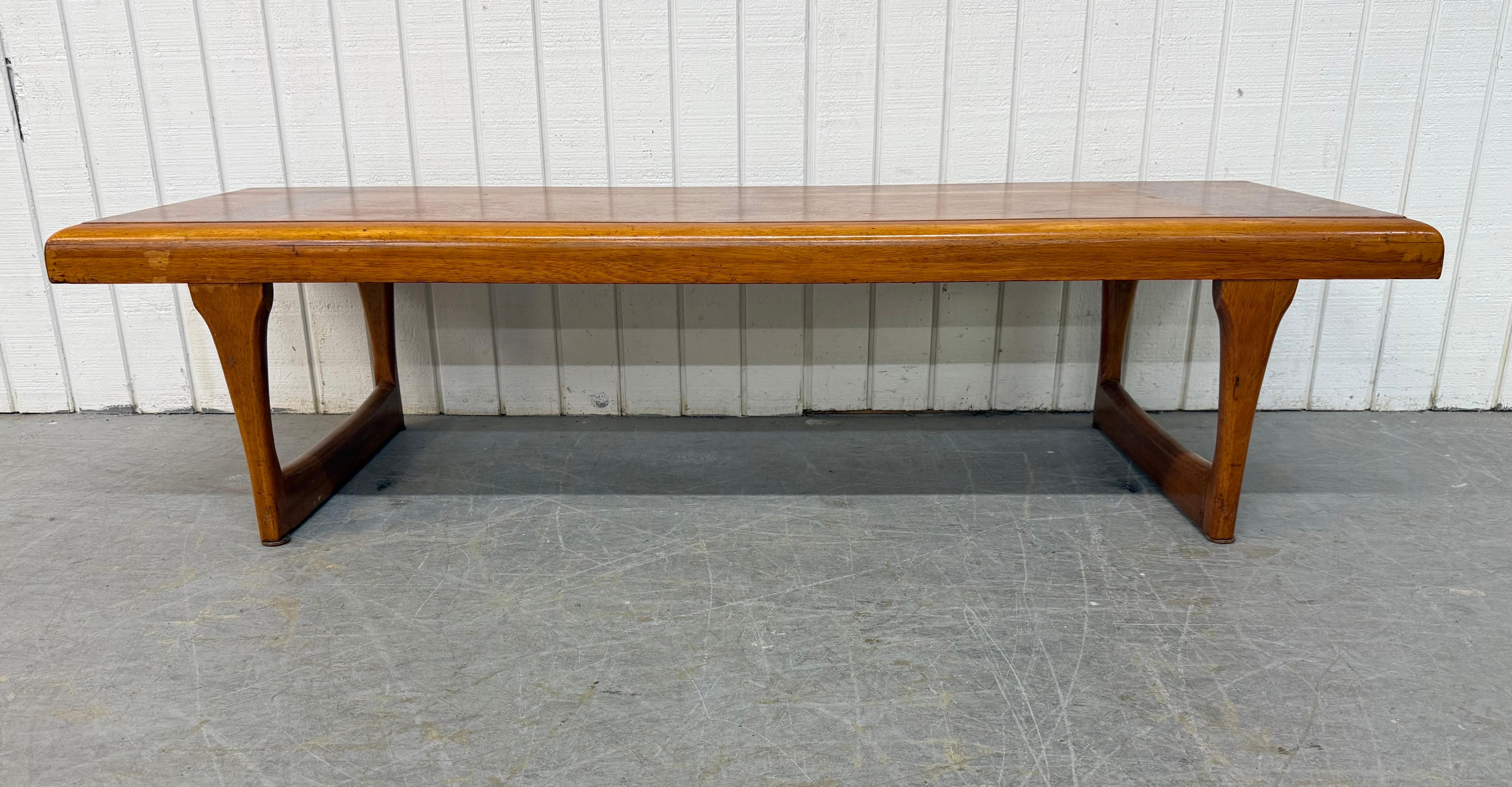 This listing is for a Mid-Century Modern Lane Walnut Coffee Table. Featuring a straight line design, rectangular top, modern legs, and a beautiful walnut finish. This is an exceptional combination of quality and MCM design by Lane!